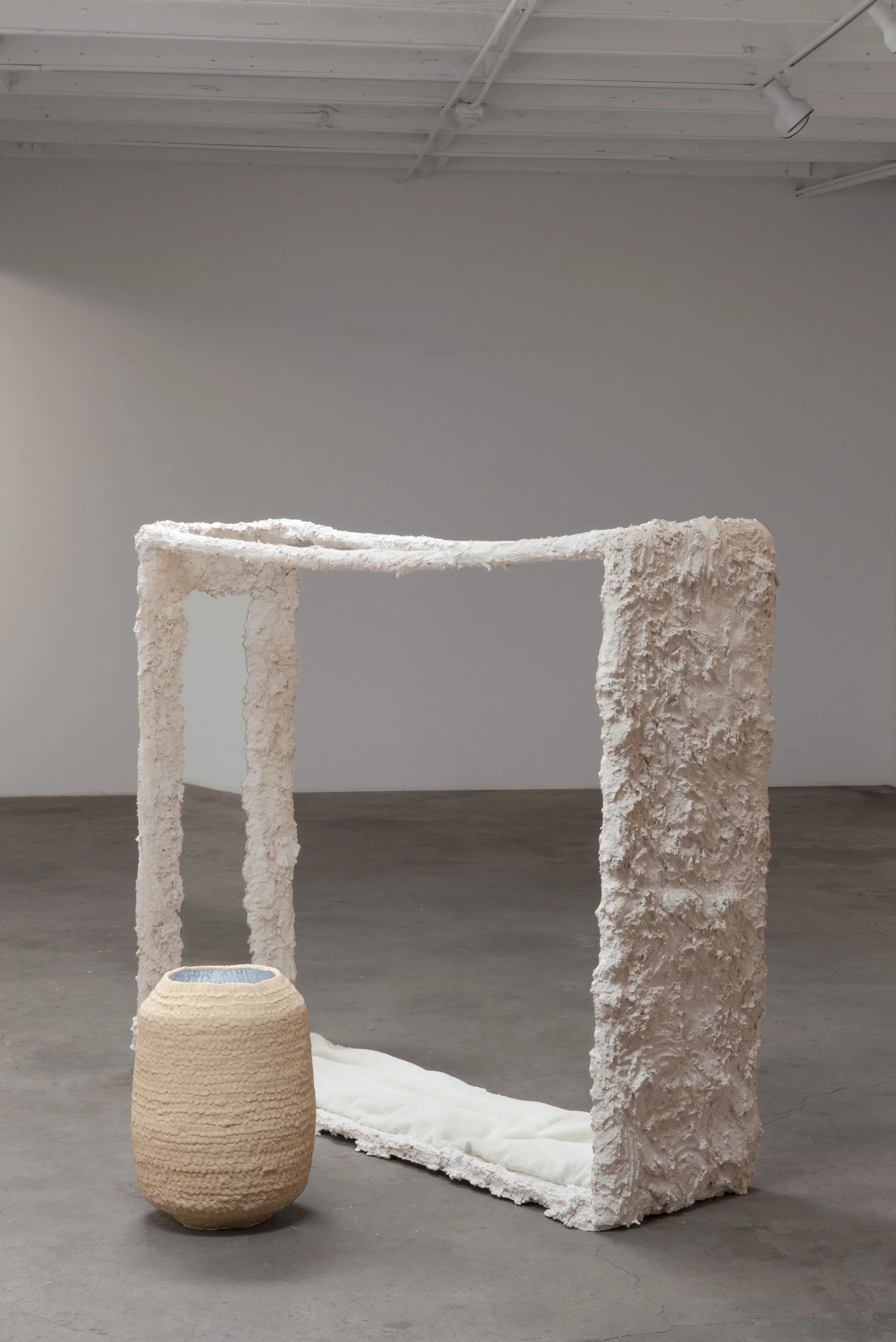Kathryn O'Halloran, Infinite Solitude, 2015, plaster, mirror, towel cushion, stoneware, 69" x 40" x 55"