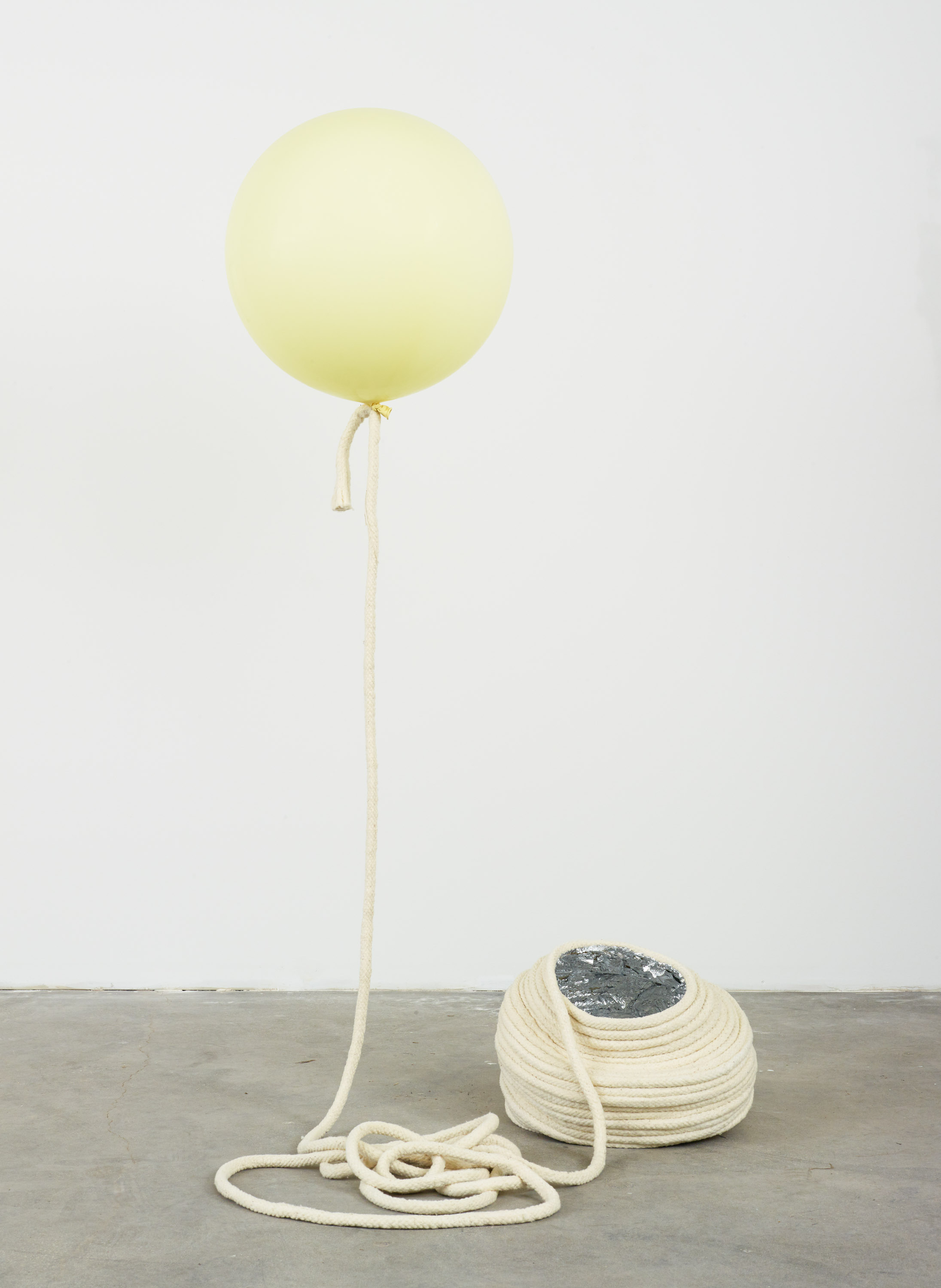Kathryn O’Halloran , Self portrait from March 2016 , 2016. Wool/cotton trim, aliminium leaf, balloon, helium, 77 x 40 x 38 inches. 