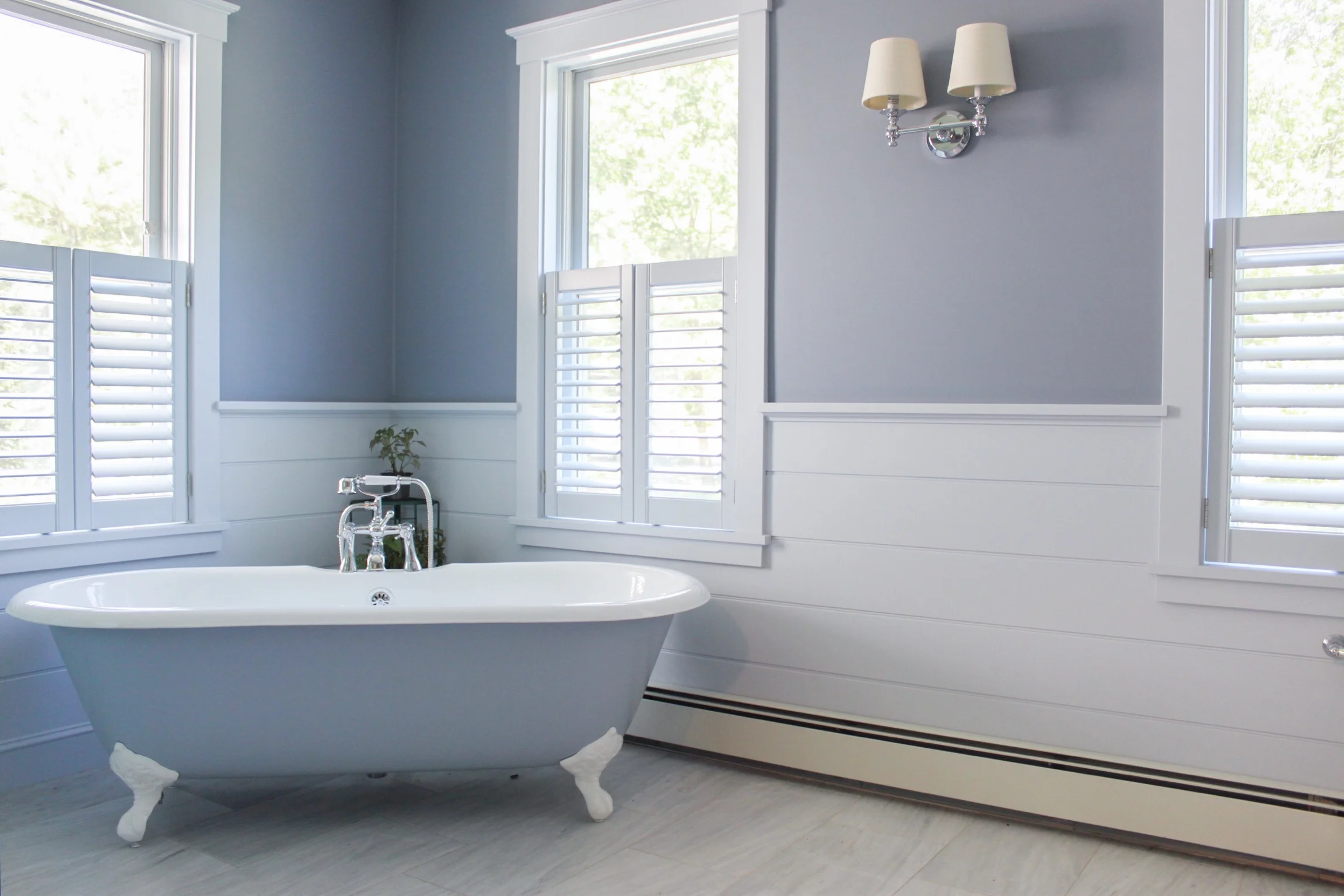 custom colored shutters maintain privacy and let in the natural light 
