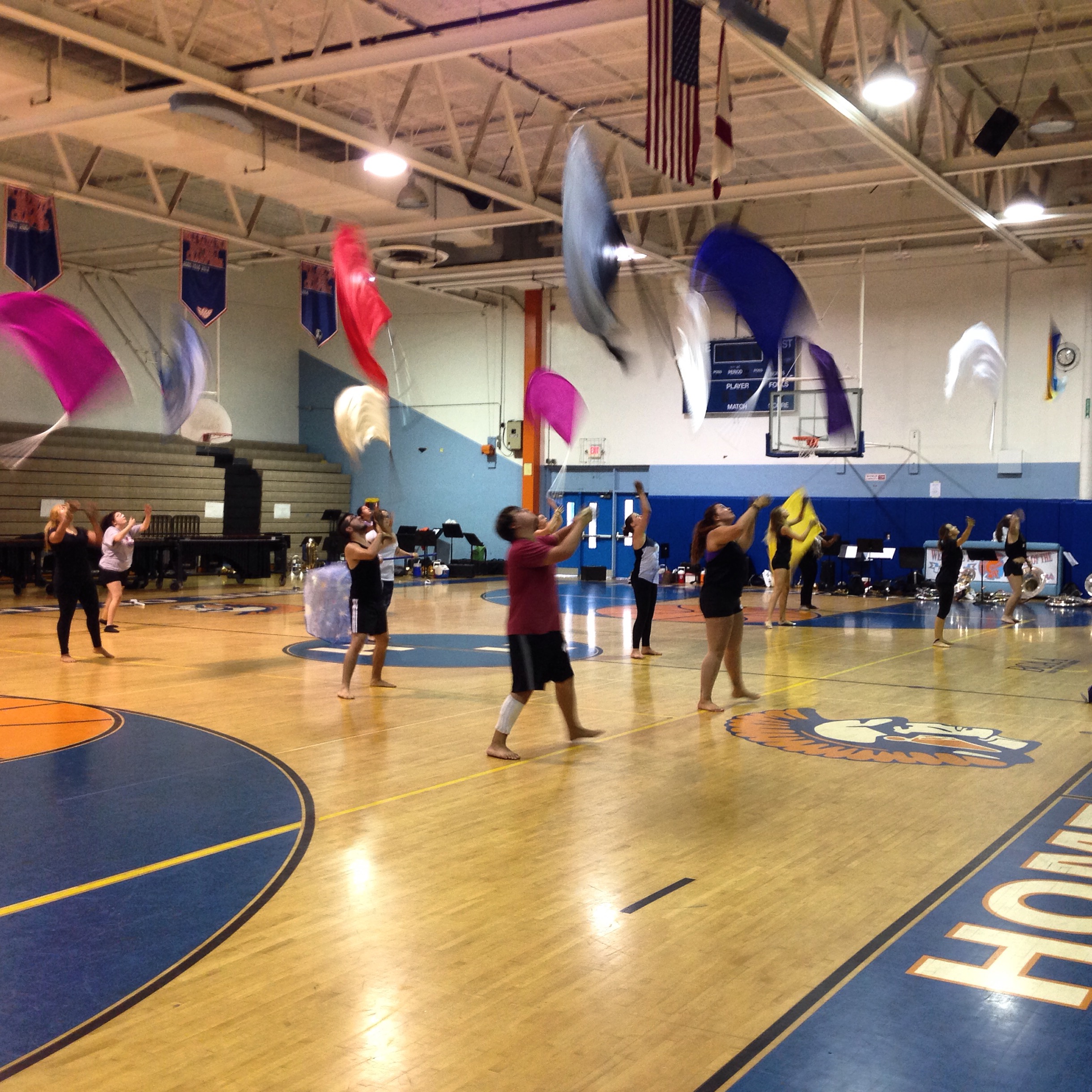Colorguard started off 'Show and Tell' with their production they created that day!