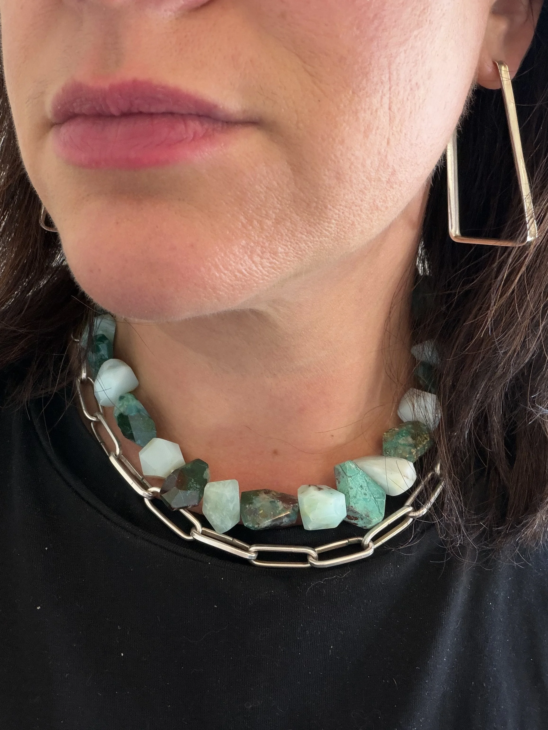 chrysoprase and chrysocolla stone bead necklace on a woman's neck