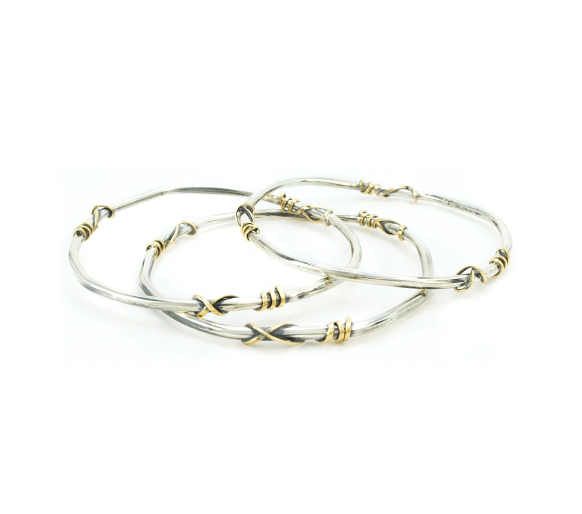 Silver and Bronze Bangle Bracelet Set © Margaret Ellis