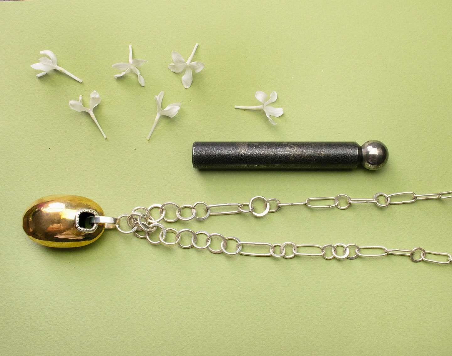 Striking in scale and soft in form, our Large Egg Necklace is a bold, sculptural piece that brings effortless drama to any look. The hand-hammered, hollow egg pendant hangs from your choice of sterling silver or bronze chain, creating a dynamic inter