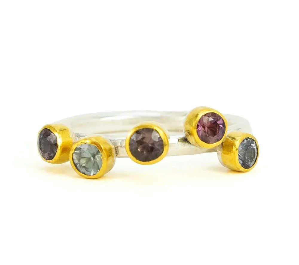 This little sterling silver ring with 1ct mixed sapphires in 23k yellow gold bezels is the perfect image of quiet luxury. We can also personalize it with stones that commemorate significant people and moments in your life. This handmade treasure is s
