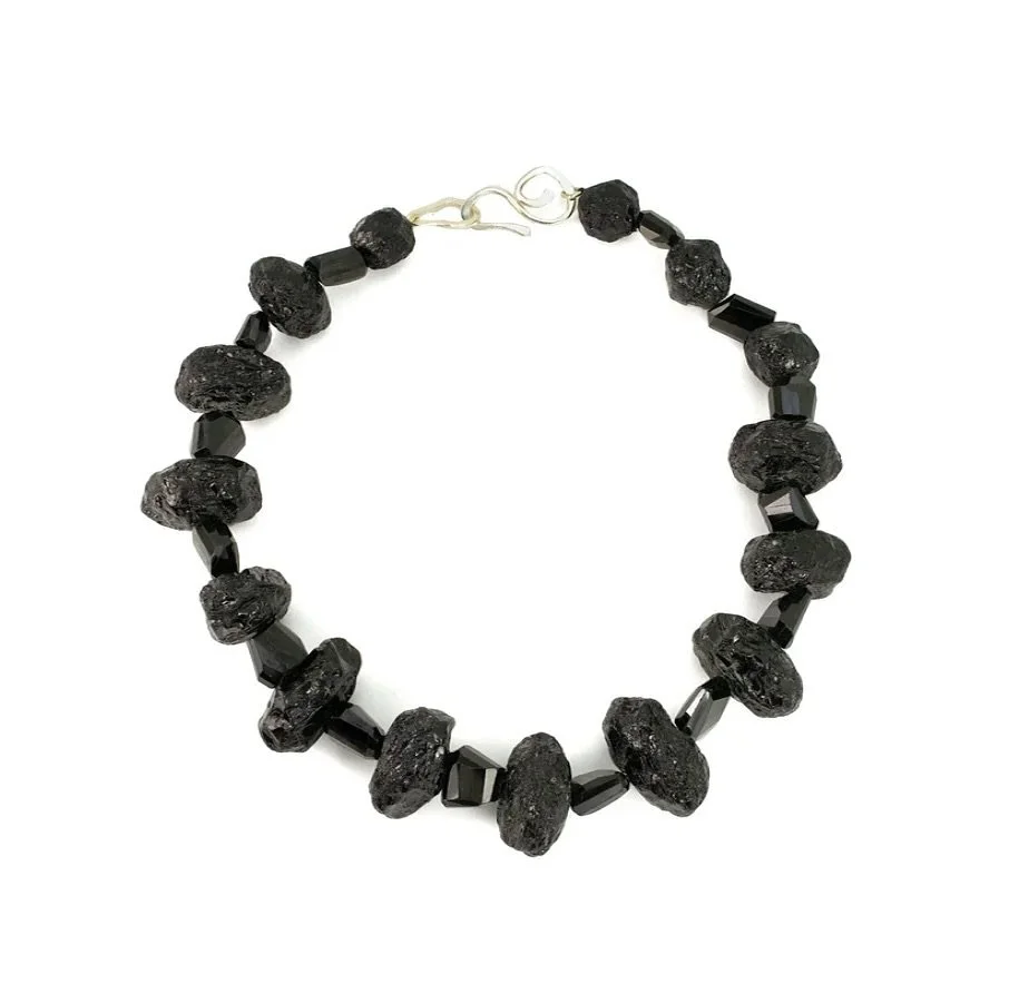 ONE-OF-A-KIND ✨✨✨ A bold, chunky statement necklace of black spinel and tourmaline celebrates the layered textures and natural beauty of the earth. With each stone carefully hand-selected for its depth and character, this design embodies the Strata c