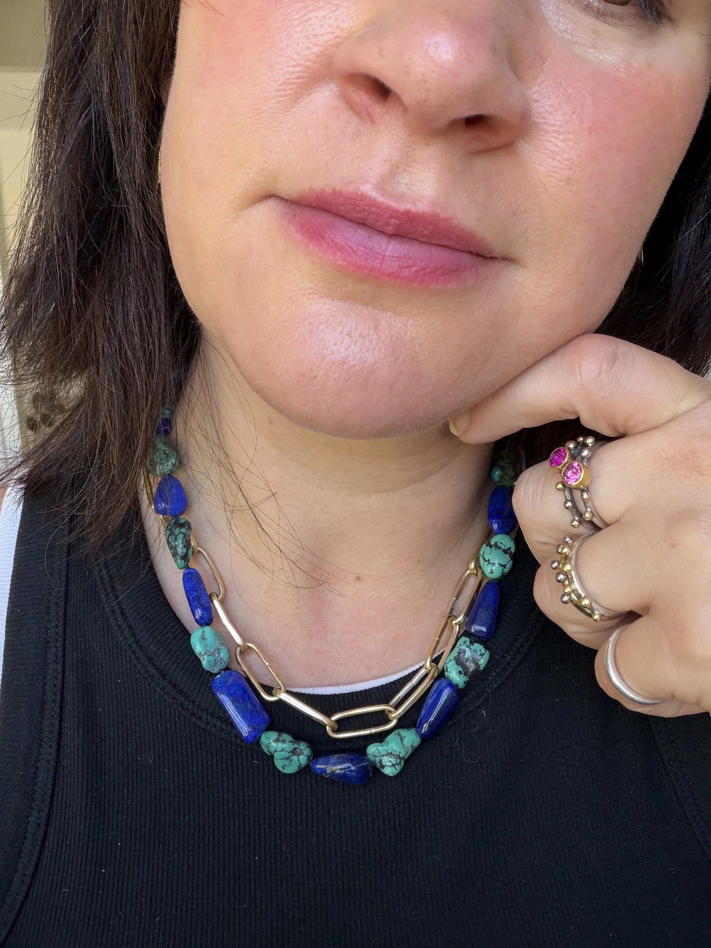 Turquoise and Lapis Stone Necklace worn with handmade chain on woman