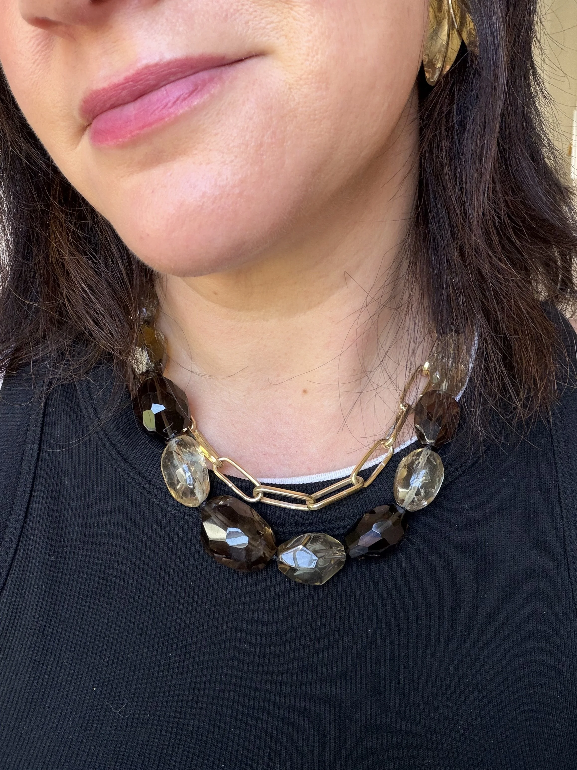 citrine and smoky quartz stone bead necklace on a woman