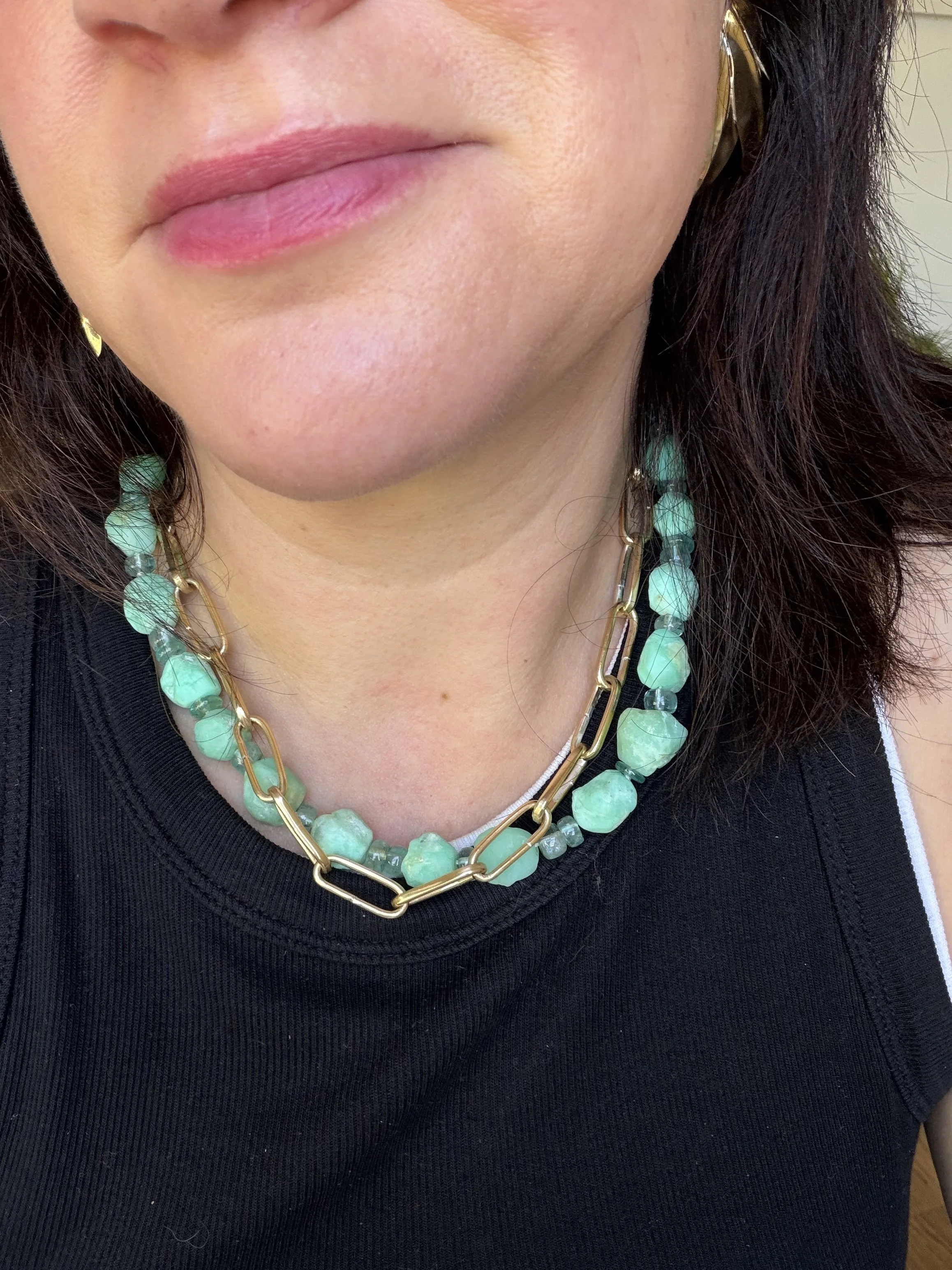 calcite and apatite stone bead necklace on a woman