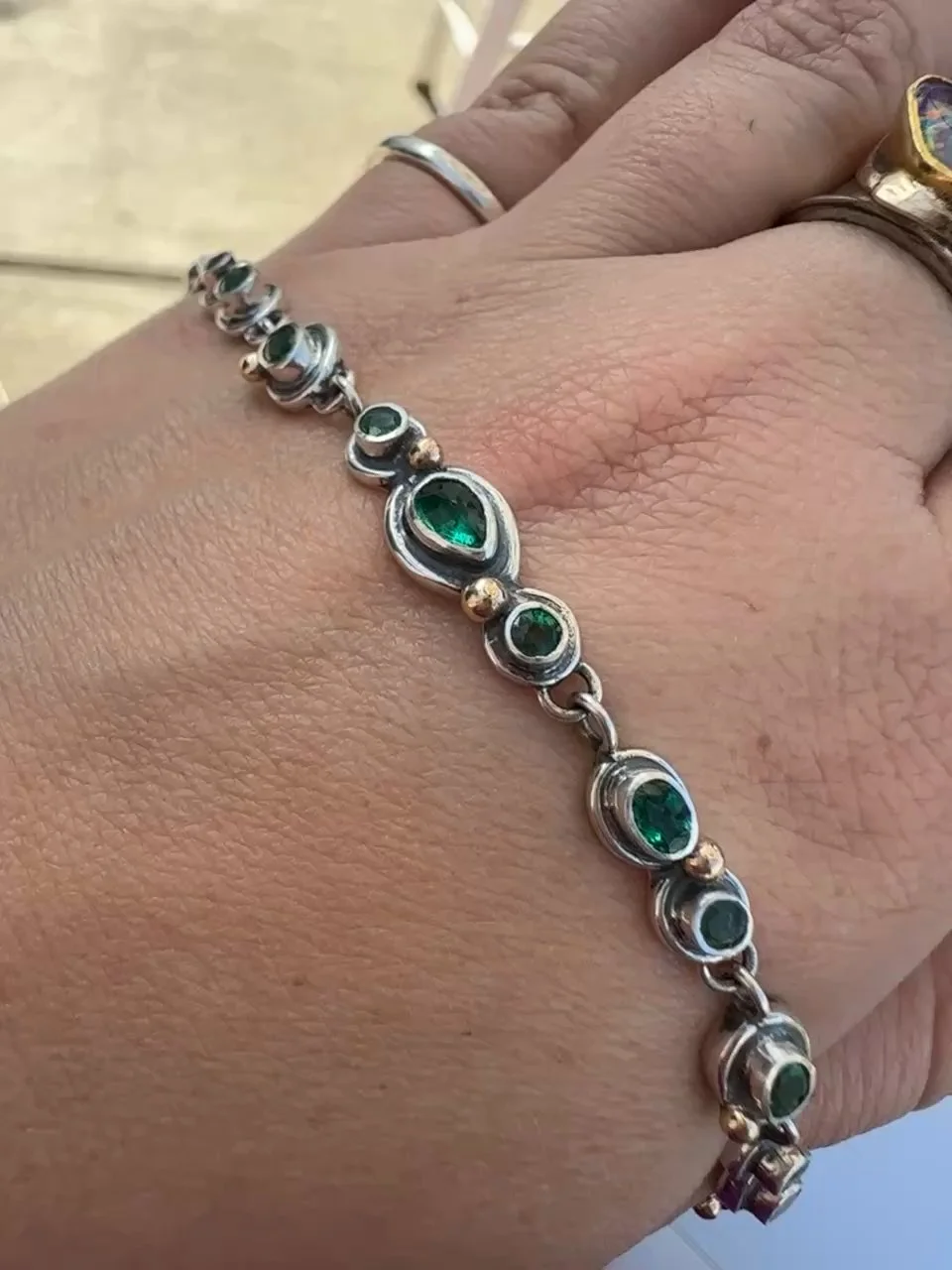 Silver and Gold Mixed Shape Emerald Tennis Bracelet