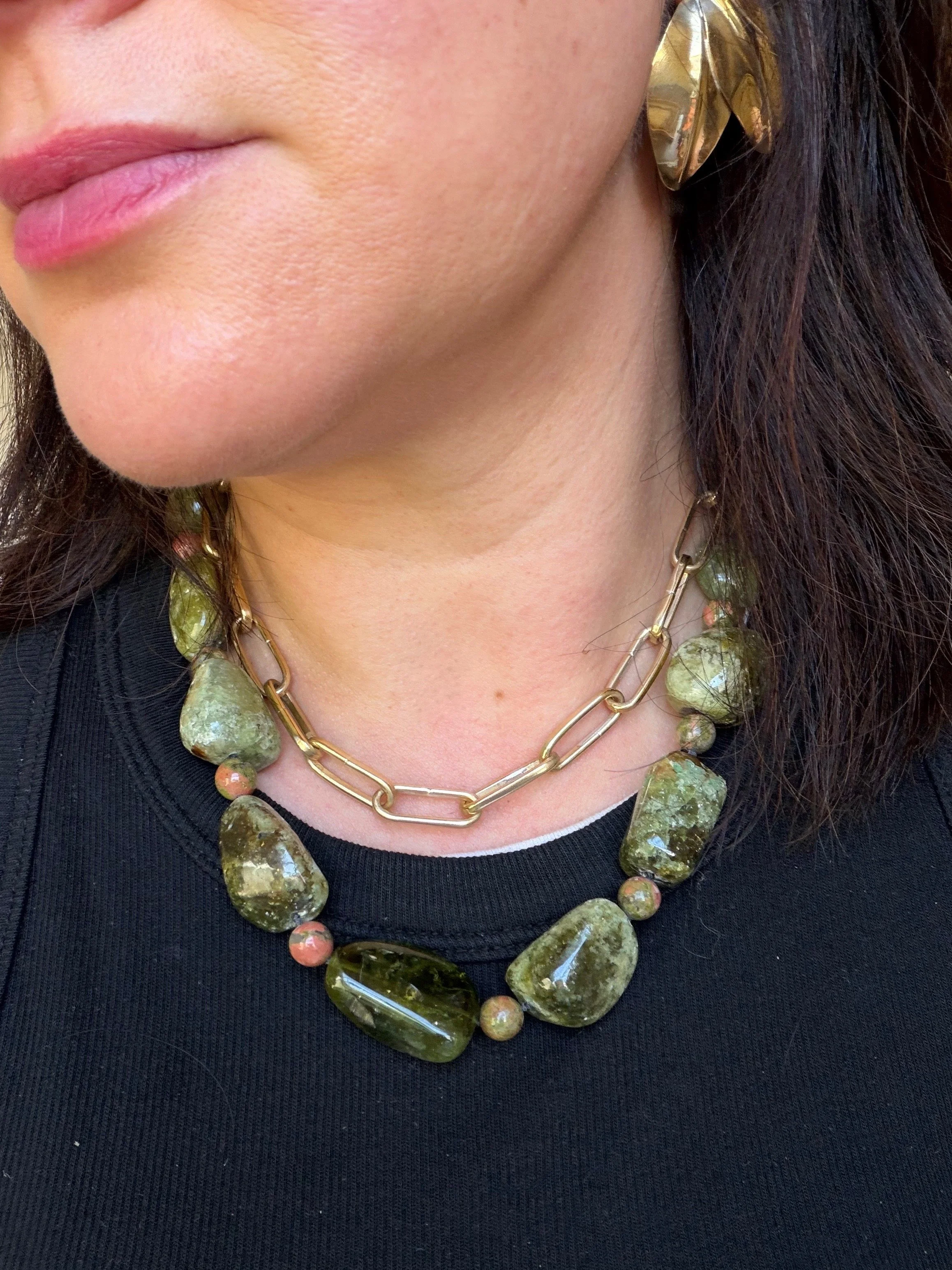 green tourmaline and unakite stone bead necklace worn on woman with gold chain