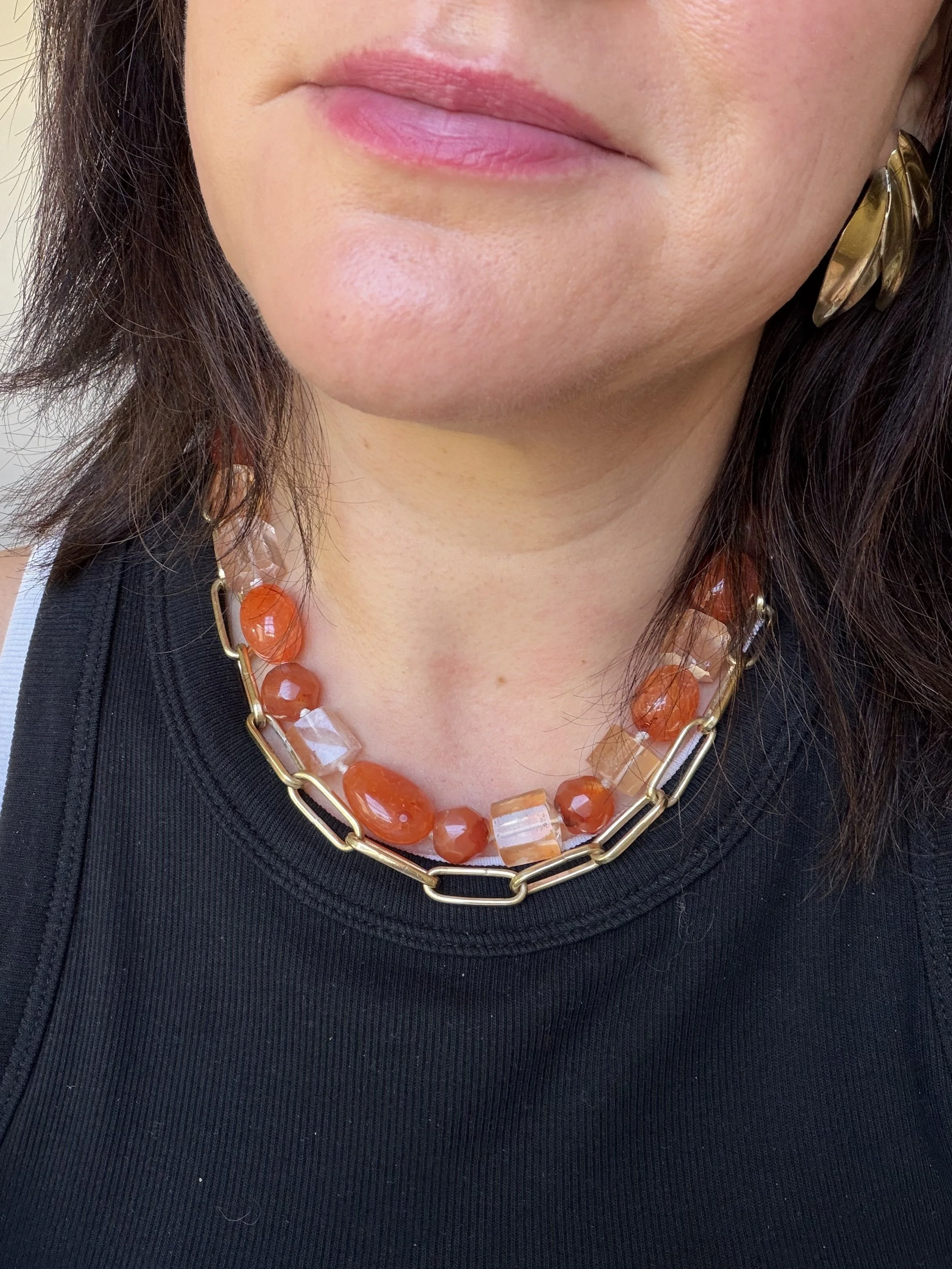 carnelian and red quartz stone bead necklace worn on woman