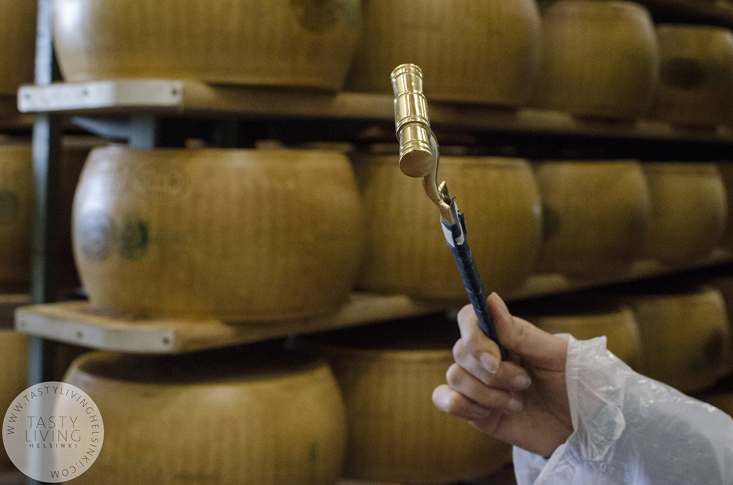 The percussion hammer is used to tap the cheese on various points to test how the maturing is going on.