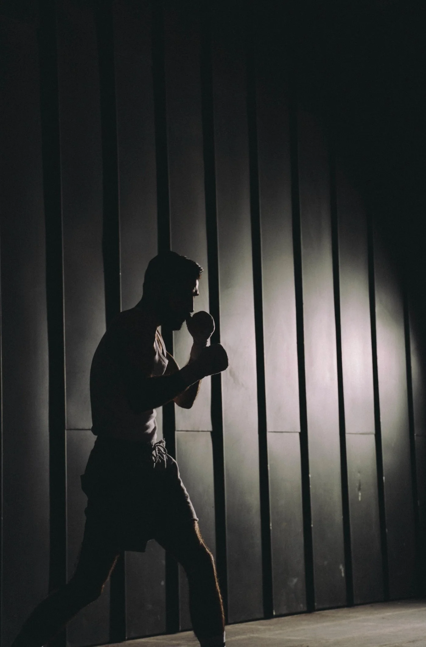 Silhouette of a boxer against striped light — Shanghai fashion and portrait photography | Victor Marvillet photographer