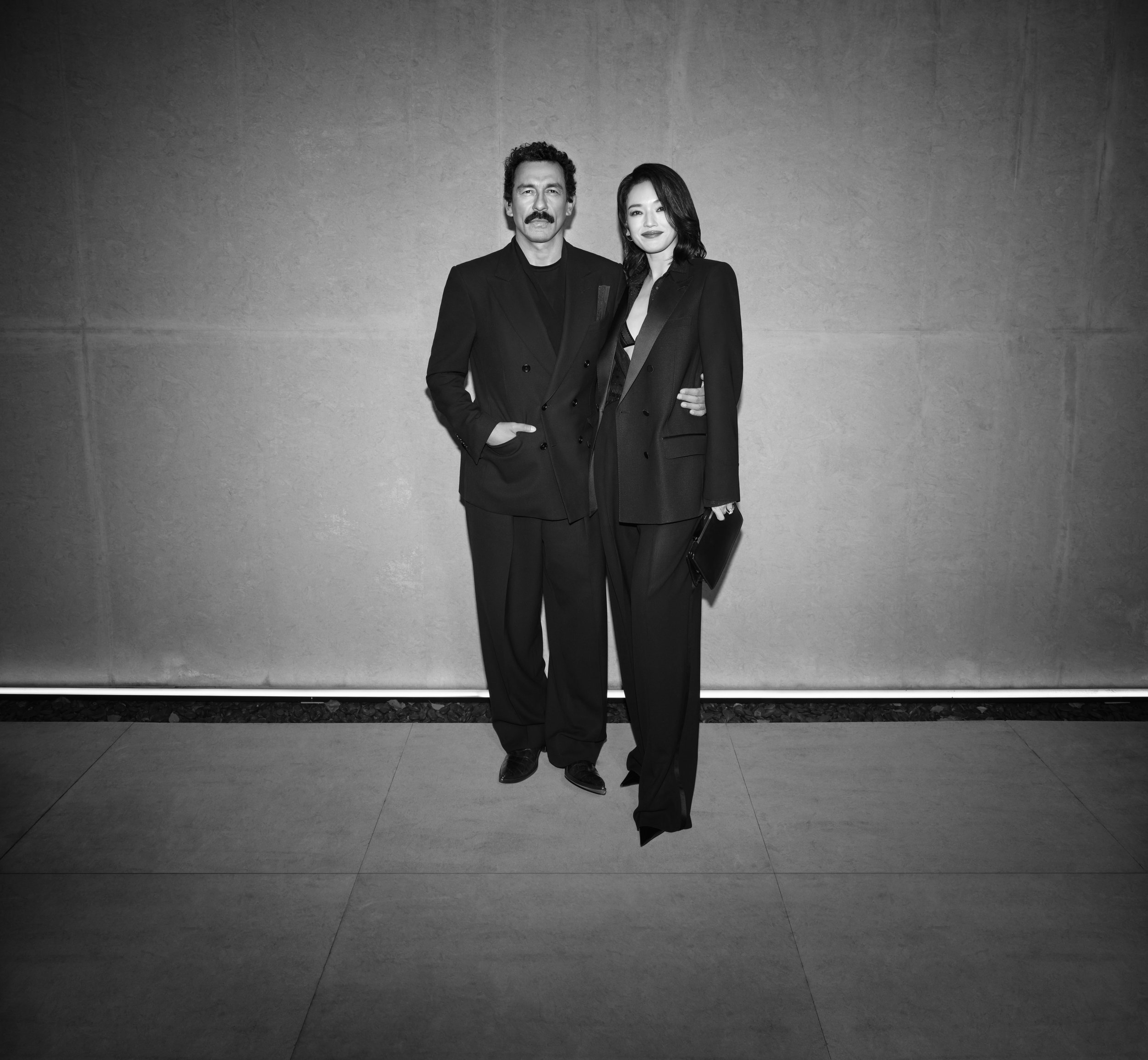 Man and woman in elegant black suits, Tom Ford fashion campaign, Tokyo — Victor Marvillet photographer