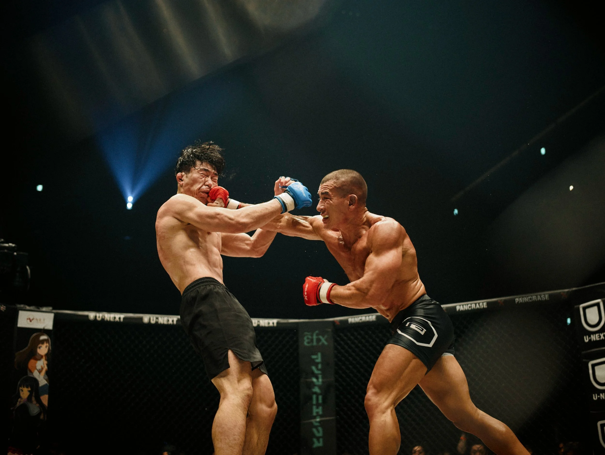 Two MMA fighters exchanging strikes in the cage — Shura No Hana MMA documentary, Tokyo | Victor Marvillet photographer