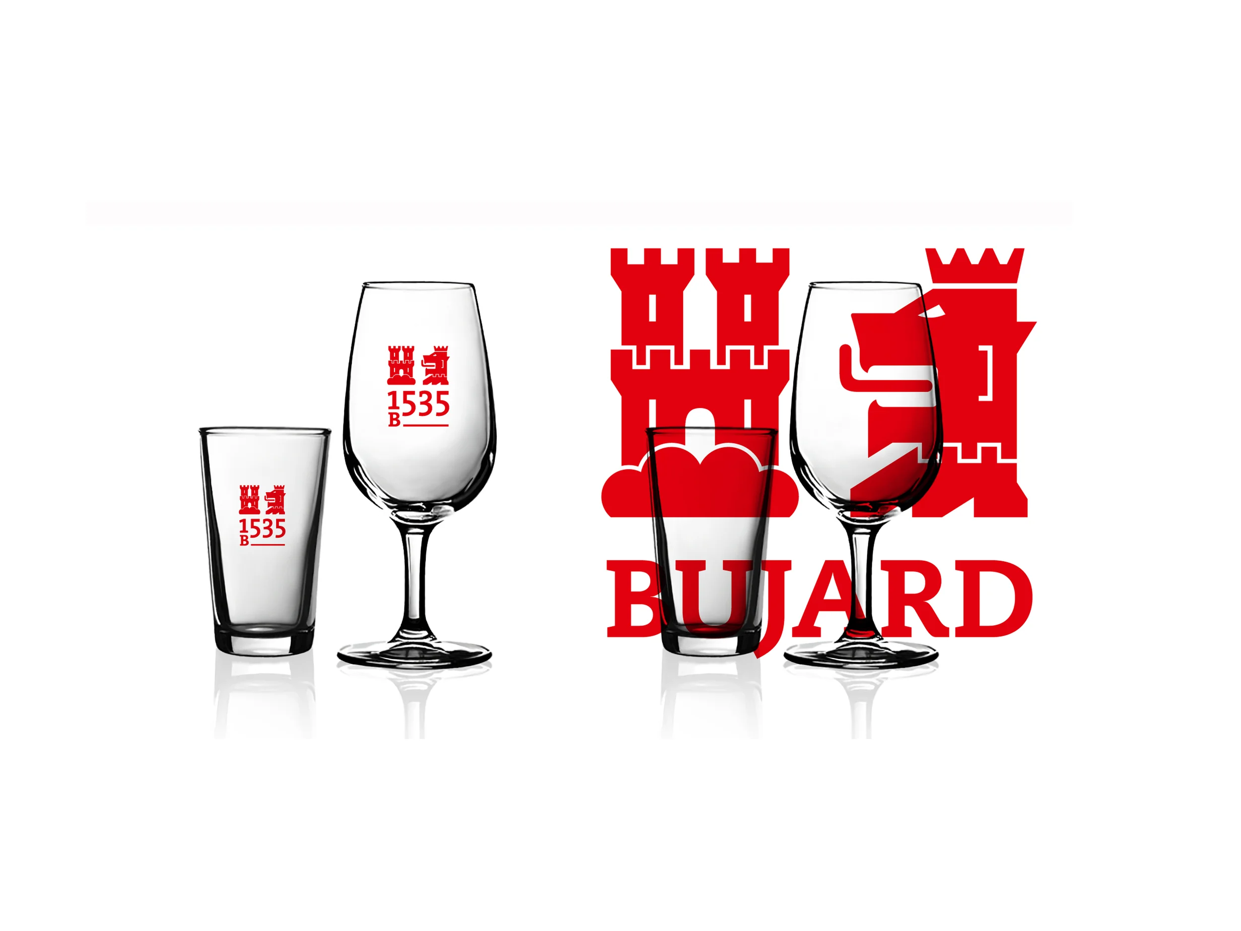  Tasting glasses and, in the background, the official logo of the company behind the vineyard and it's products. 