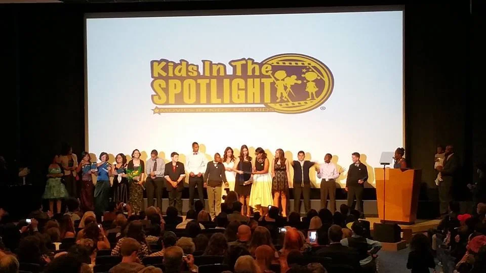 A group of KITS students standing on the stage at last year's film festival competition