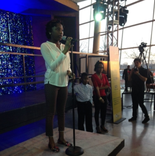 Raymani, a student from Higher Achievement , reads an original work of poetry centered on the theme of love. Higher Achievement works to "close the opportunity gap" for middle school youth in DC. "Before Higher Achievement, I never had opportunities like this," she said.