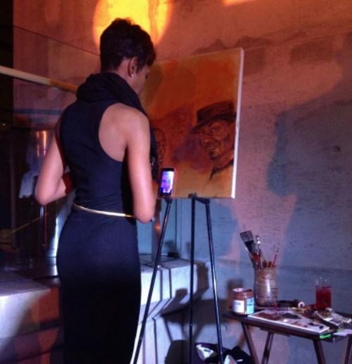 DC emerging artist J'Nell Jordan paints as part of the Gallery for Good. In her artist's statement, Jordan noted that she loves to capture "feel good" moments. 
