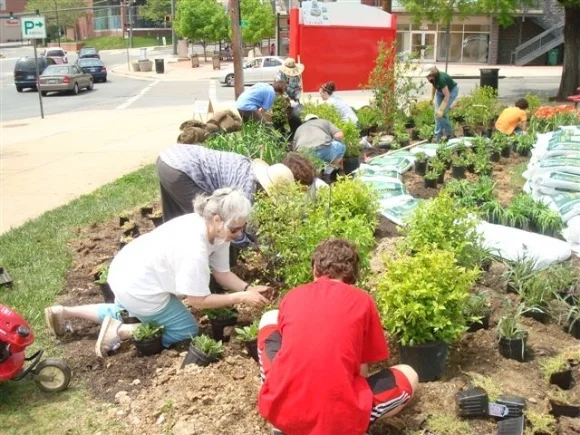 Volunteers from Green Wheaton and Friends of Sligo Creek team up to plant a community garden./Photo source: stormwaterpartners.org