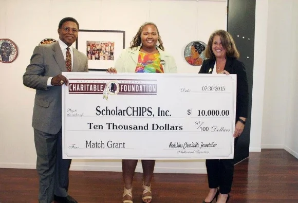 ScholarCHIPS being presented a $10,000 match grant by the Washington Redskins Charitable Foundation. Photo credit/ Sidney & Company