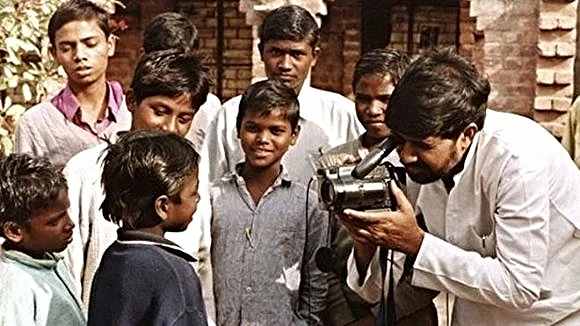 Kailash Satyarthi with former child slaves in India/Photo credit: The BBC