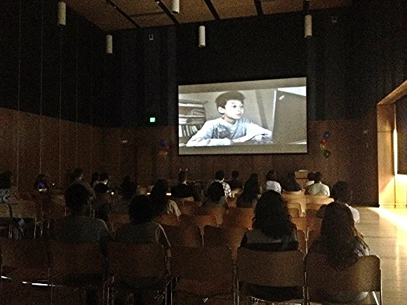 A film is shown at the Gandhi Brigade Youth Media Festival
