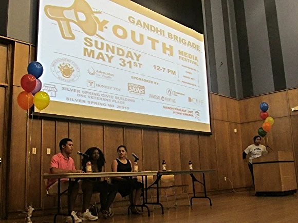 Teens participate in a panel discussion