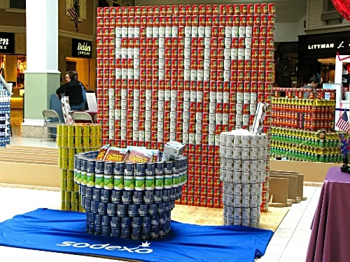 Canstruction is a charity art exhibition of sculptures created from unopened cans of food, which are subsequently donated to hunger relief organizations.