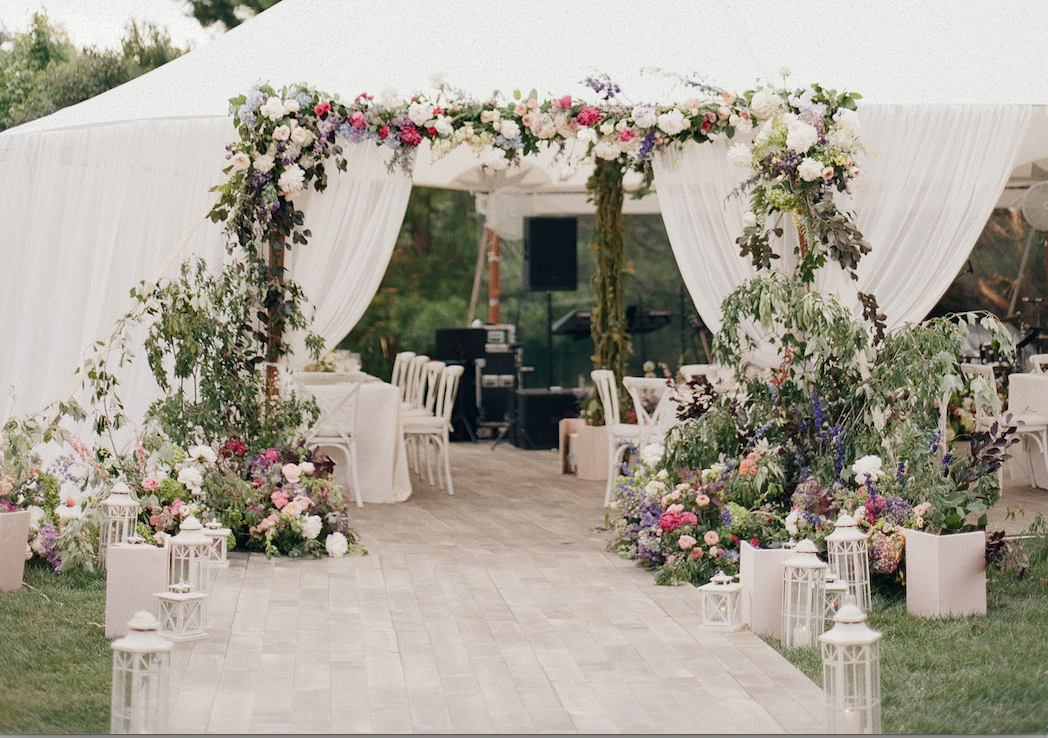 Reception tent floral decor. 