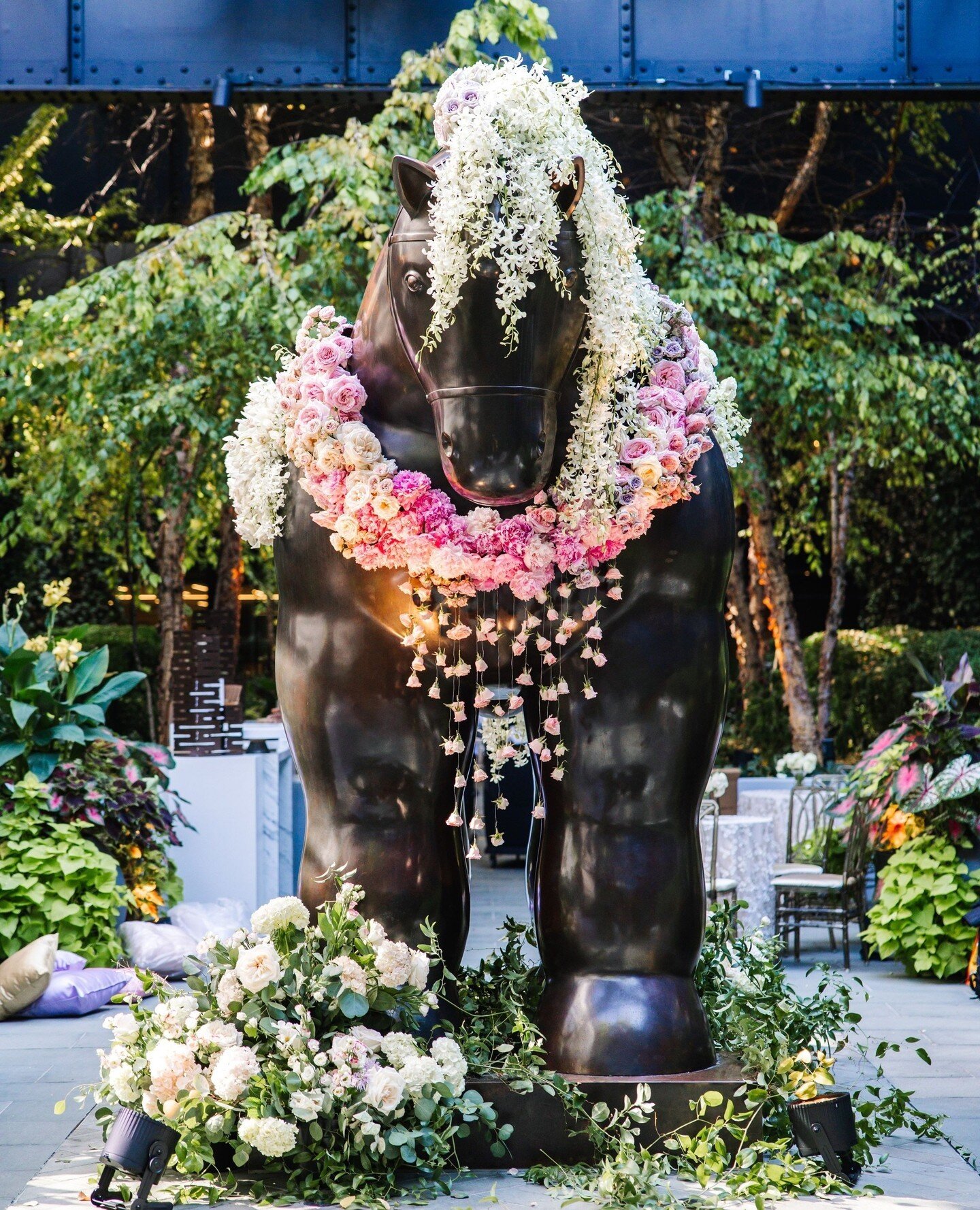 Mane n' Tail Shampoo's next sponsorship, perhaps? 🐴 E + K celebrated their engagement with a chic garden soiree in the courtyard at @sagamorependrybaltimore⁠. We had the chance to be @botero_artist's Horse's stylists for the evening, and side-swept 