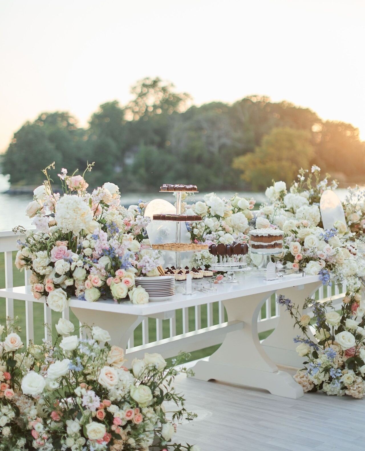 ⁠The view of the Chesapeake Bay is a knockout all on its own, so having it as the backdrop of this rainbow pastel meadow dessert display was a gift! The sunset left a soft golden illumination as the desserts took their place for the sweetest end to t