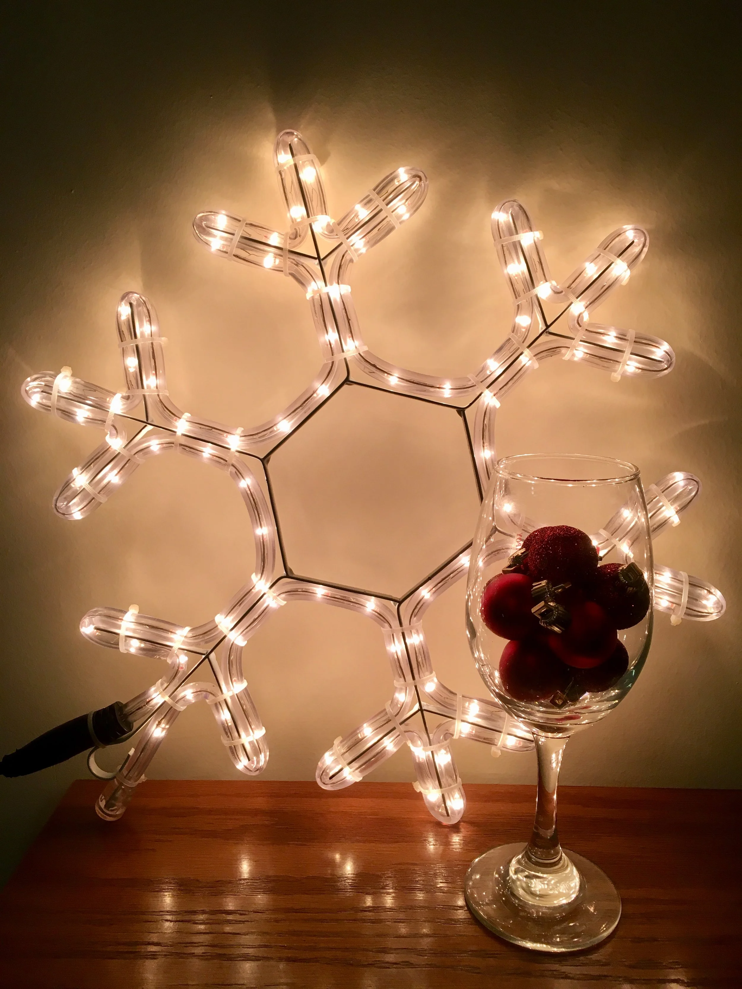 Trying to make my accommodation look festive with lights and a glass full of baubles