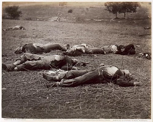 Timothy O'Sullivan, The Field Where General Reynolds Fell, Gettysburg, Pennsylvania, silver print, 1863; among other things, this photograph anticipates the dethroning of documentary illustration, then nearing its height in the Civil War era; from a purely visual perspective, the image highlights the new pictorial sensibility of the machine: the focus on the corpses brings the viewer's gaze down, very nearly past the horizon line, opening up an abstract field of composition unconcerned with the grand pictorialism of declamatory history painting–instead, a gritty look-at-that! as well as a new kind of two-dimensional design for images
