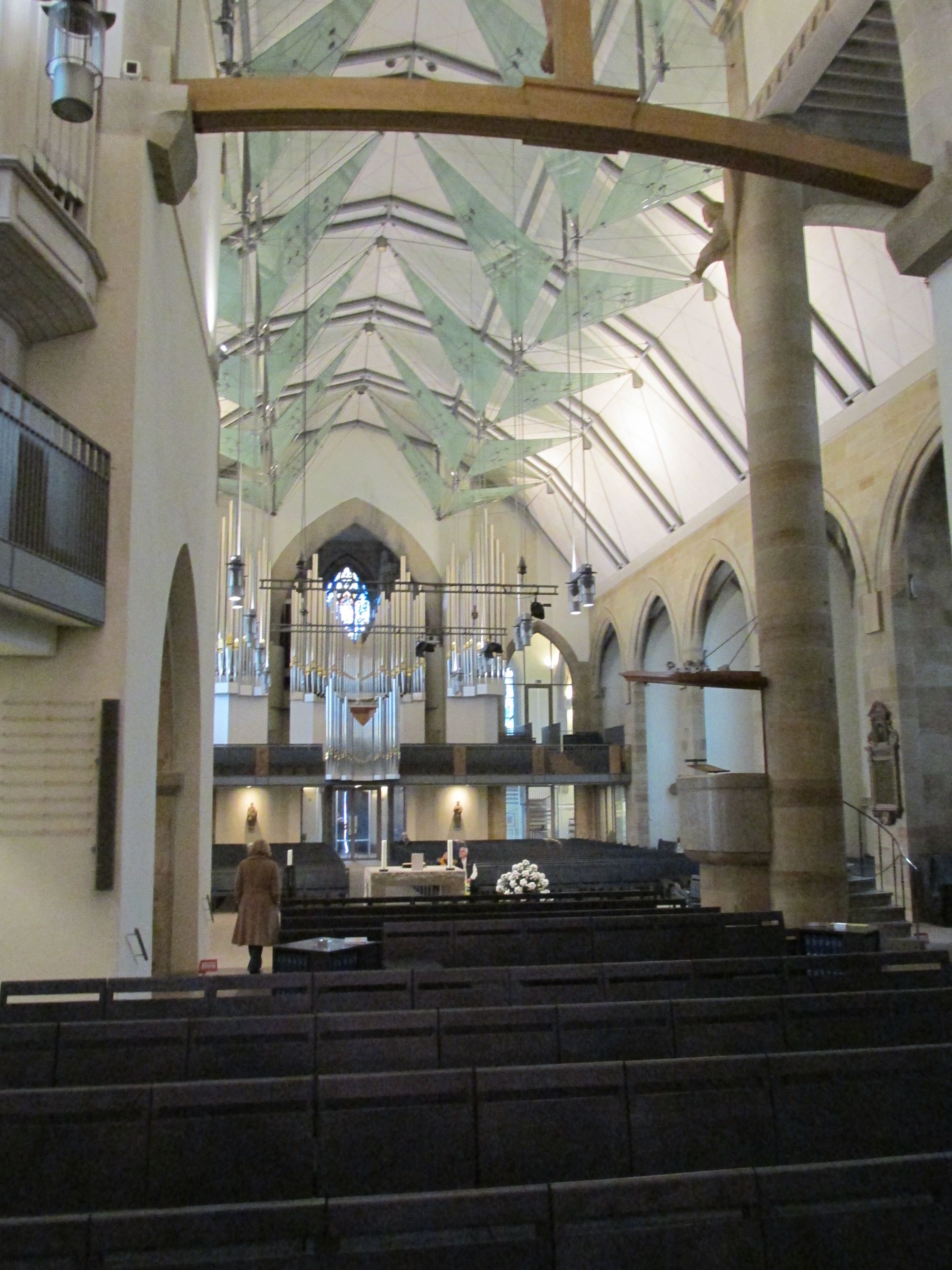 The Stiftskirche restored. A 1950s barrel vault slathered with asbestos was removed in favor of a gothic quotation in the vaulting and glass panels during a renovation completed in 2003.