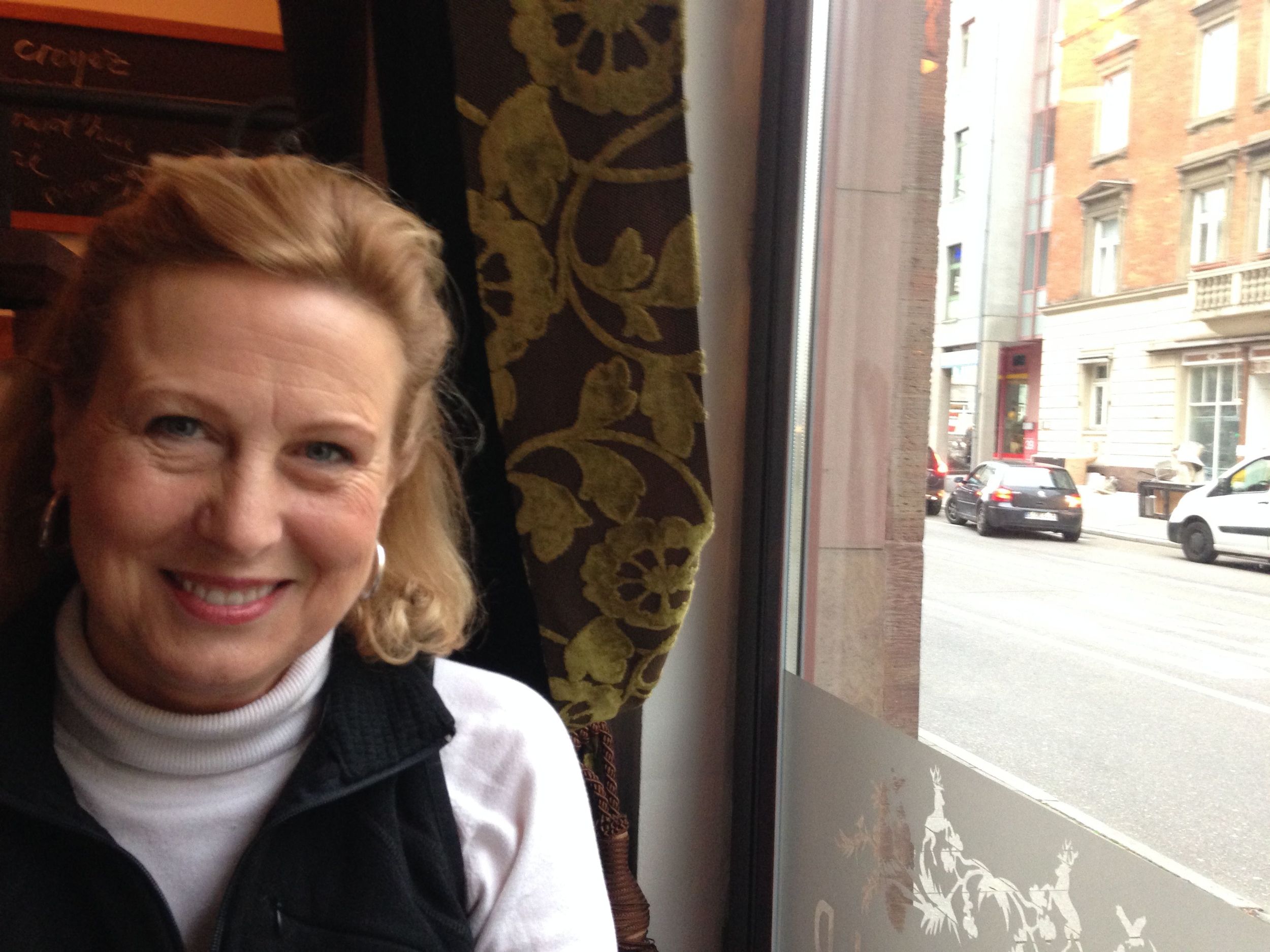 Lori in a cafe on Olgastrasse .