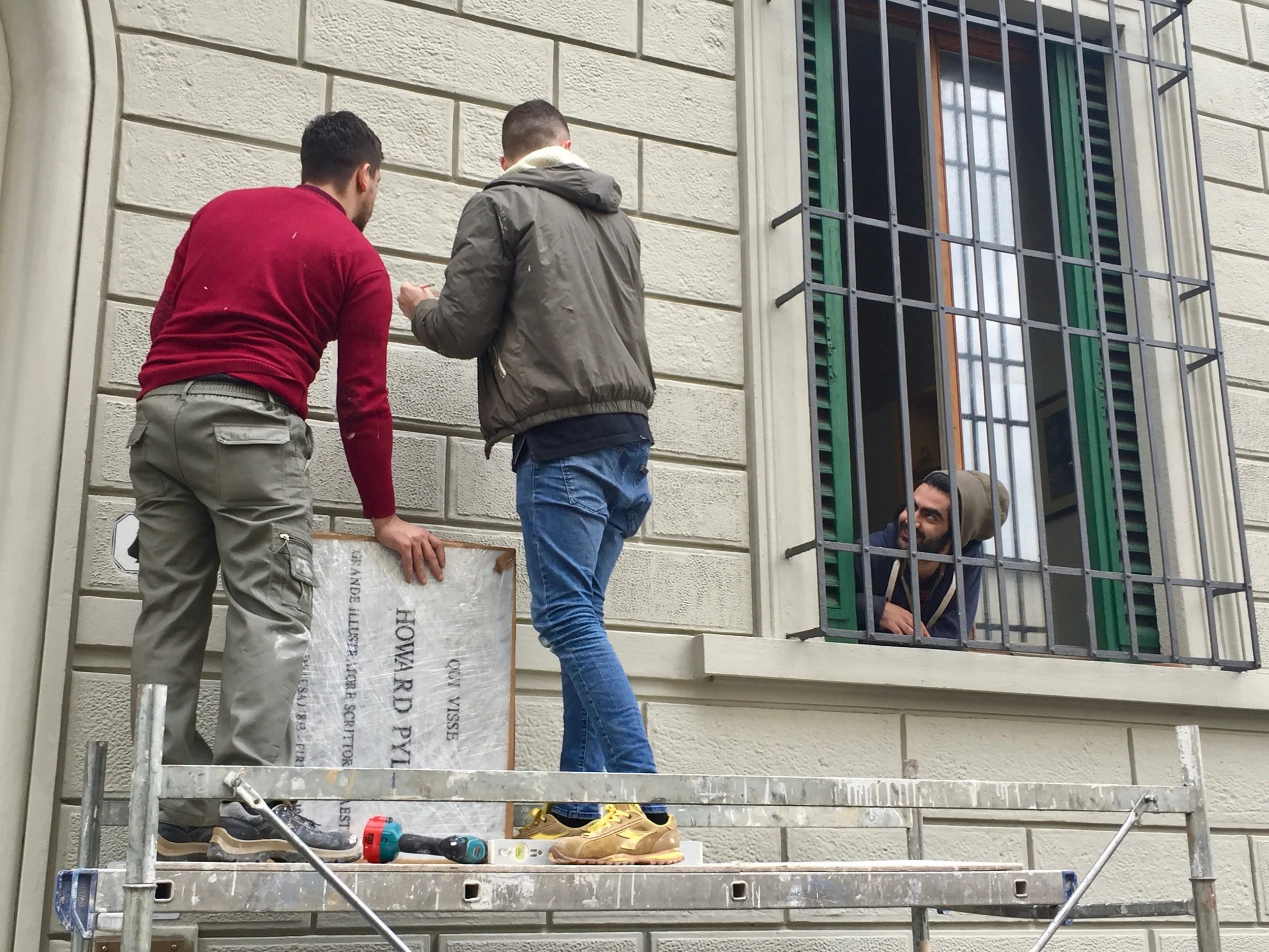 Howard Pyle Plaque Installation , photograph by Jeff Pike (with Rockwellian Flourish of guy in window), Florence, Italy, March 11, 2018. 
