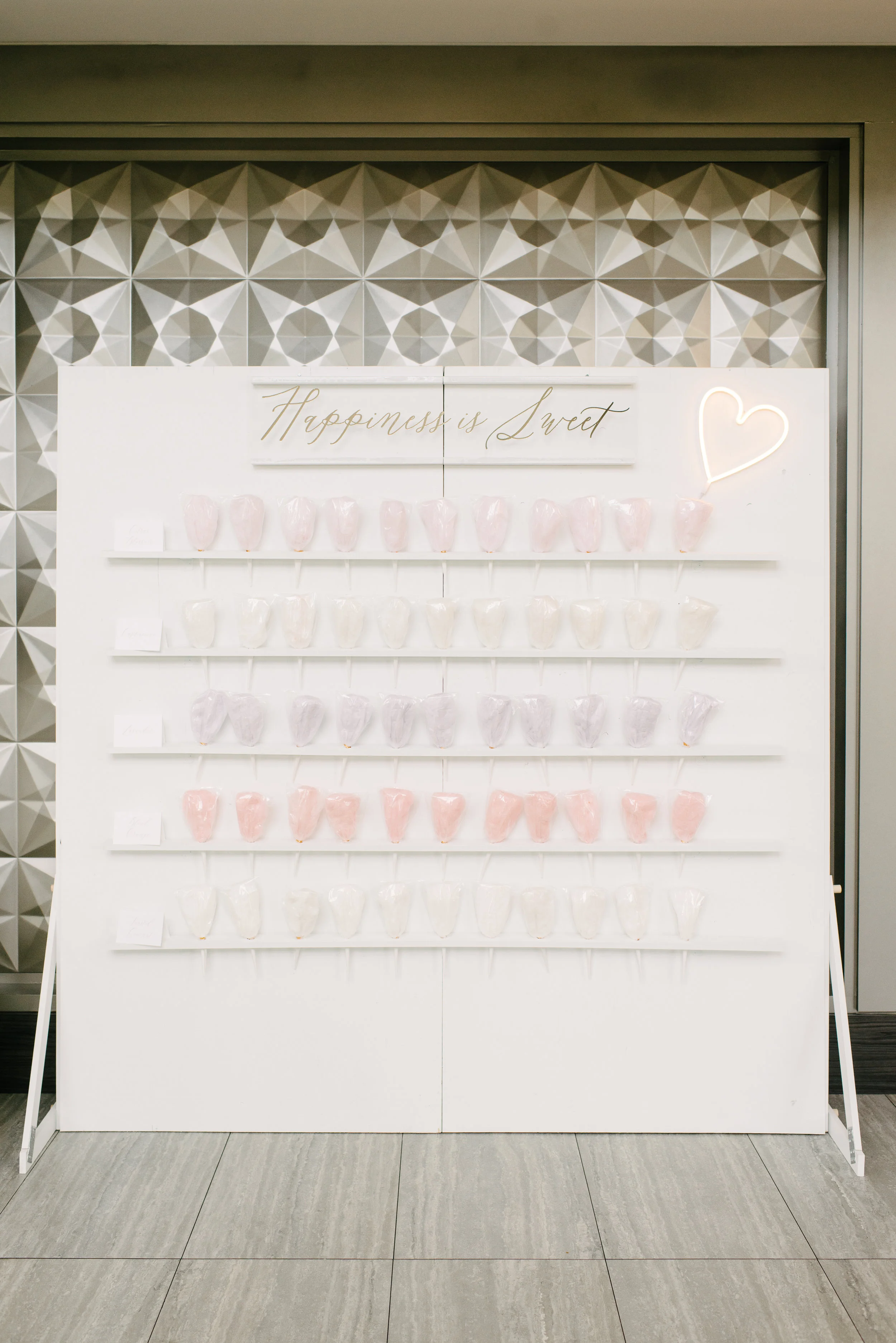 Sweet treat! I think it’s more than time to embrace our inner child and along with it the fun-filled and colorful wonder that is cotton candy! Has anyone ever had a bad time with cotton candy in their hand? A custom cotton candy wall is guaranteed to give your wedding a sugar rush! Photo: Mango Studios Cotton Candy: Fancy Pufs
