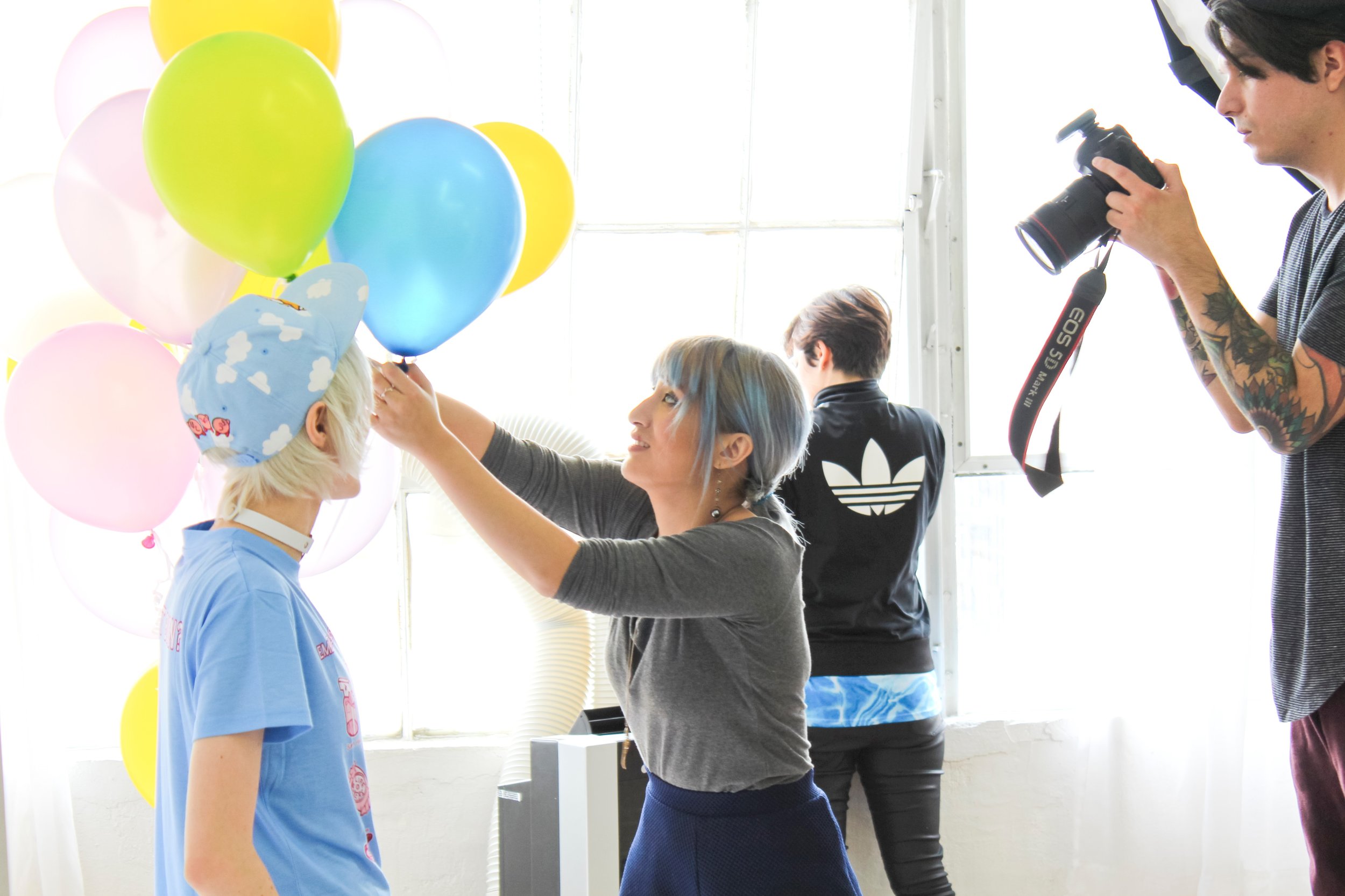 Trying to color coordinate the balloon colors. While trying to make them not block the model. Model: Nico.