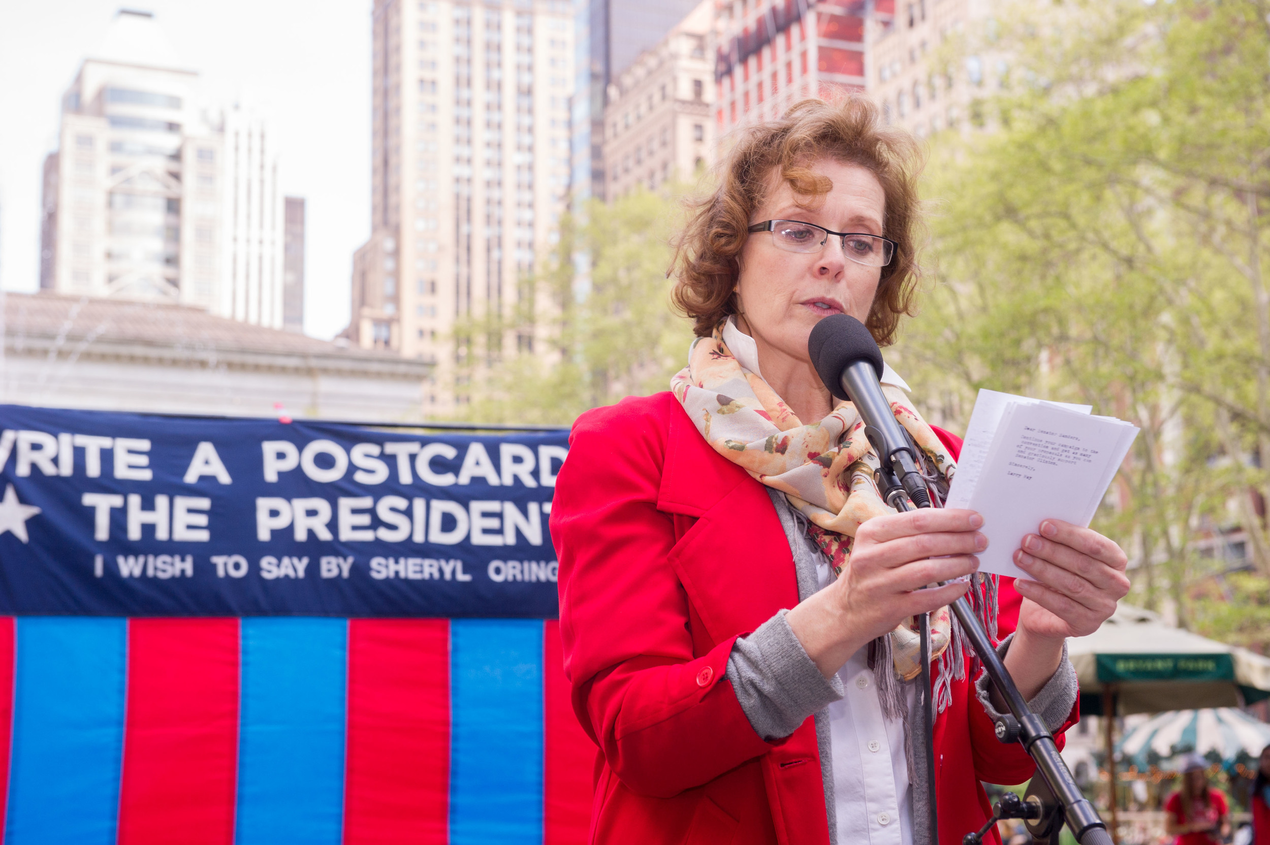   Anne-Marie Cusson reads at Bryant Park. Photo by Christian Carter-Ross.  
