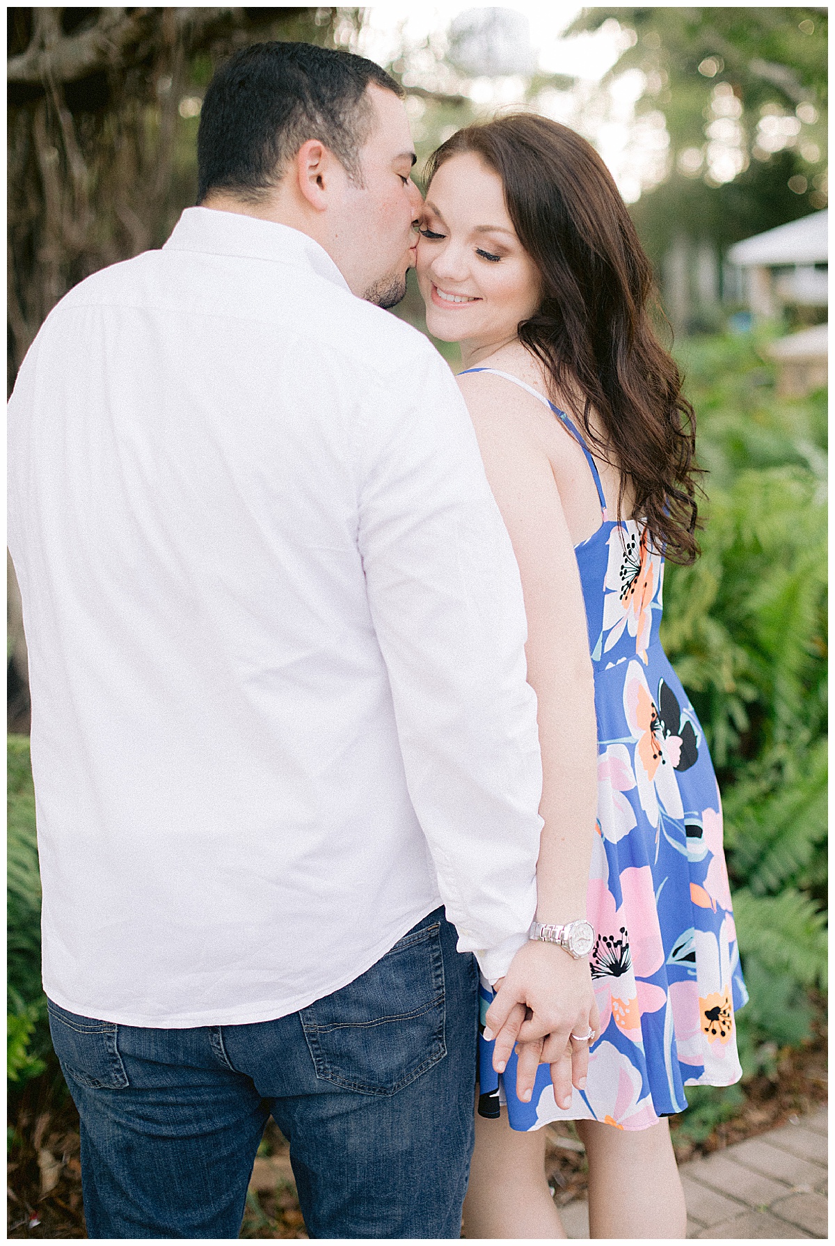 Kissing his fiance on the cheek | Stuart Fl