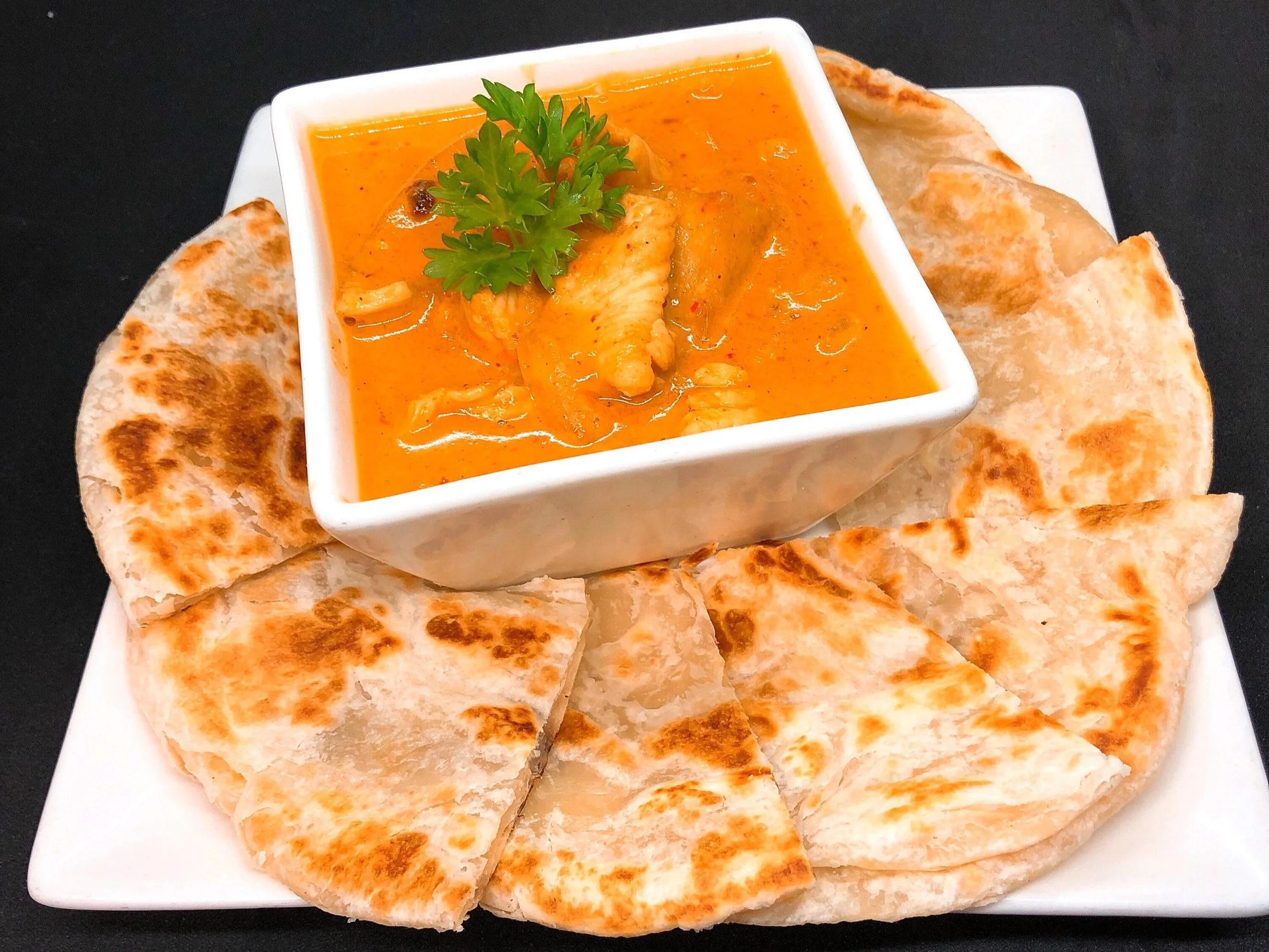 Yellow curry with Roti.JPG
