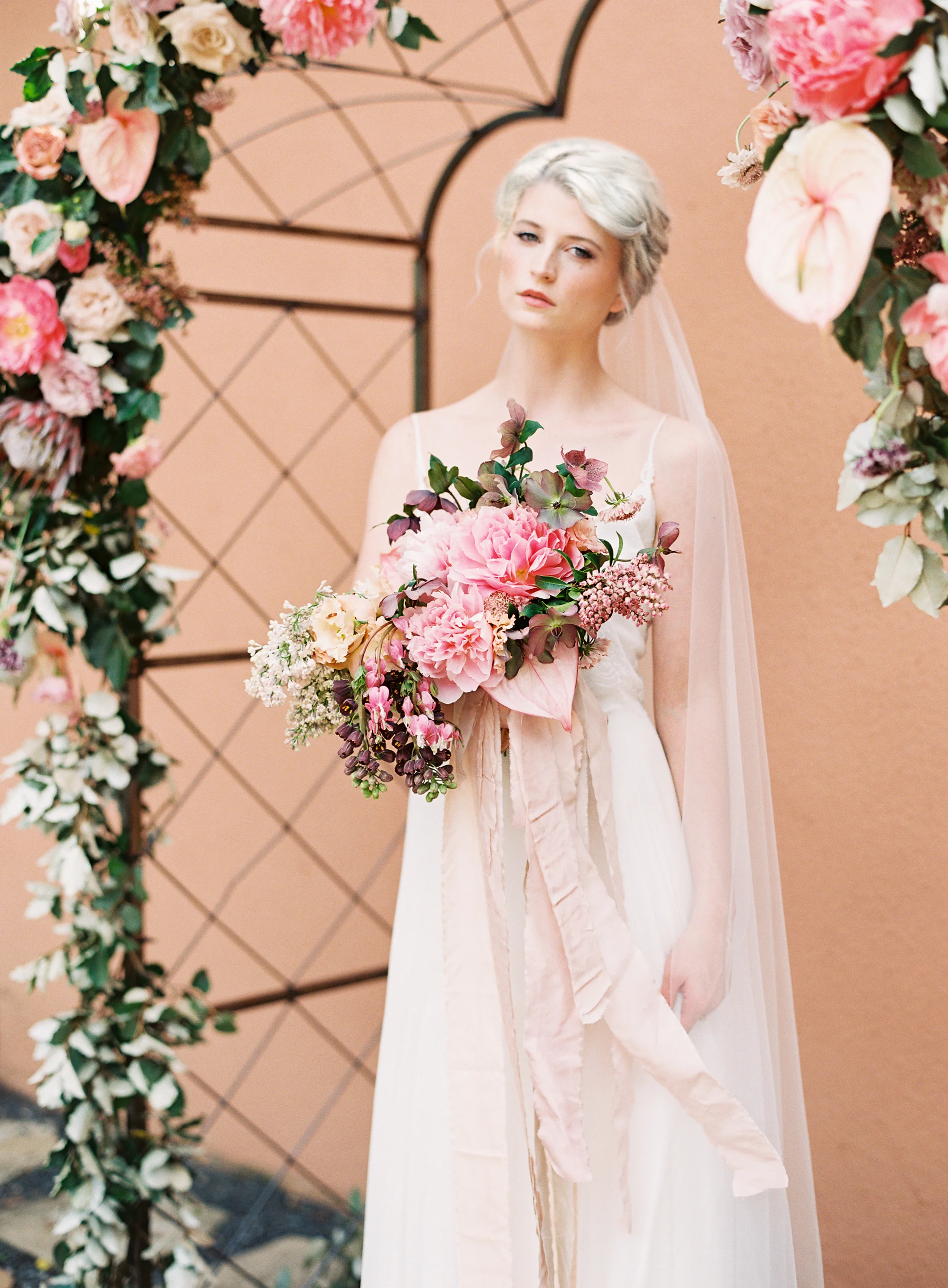Organic, terra cotta pink wedding inspiration featured in Style Me Pretty