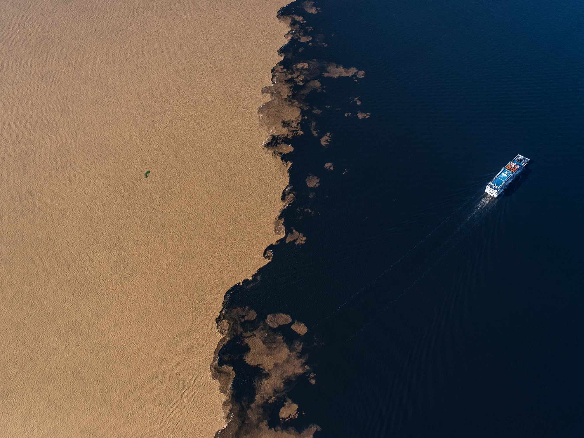 The muddy Amazon doesn't mix with the clearer Rio Negro.