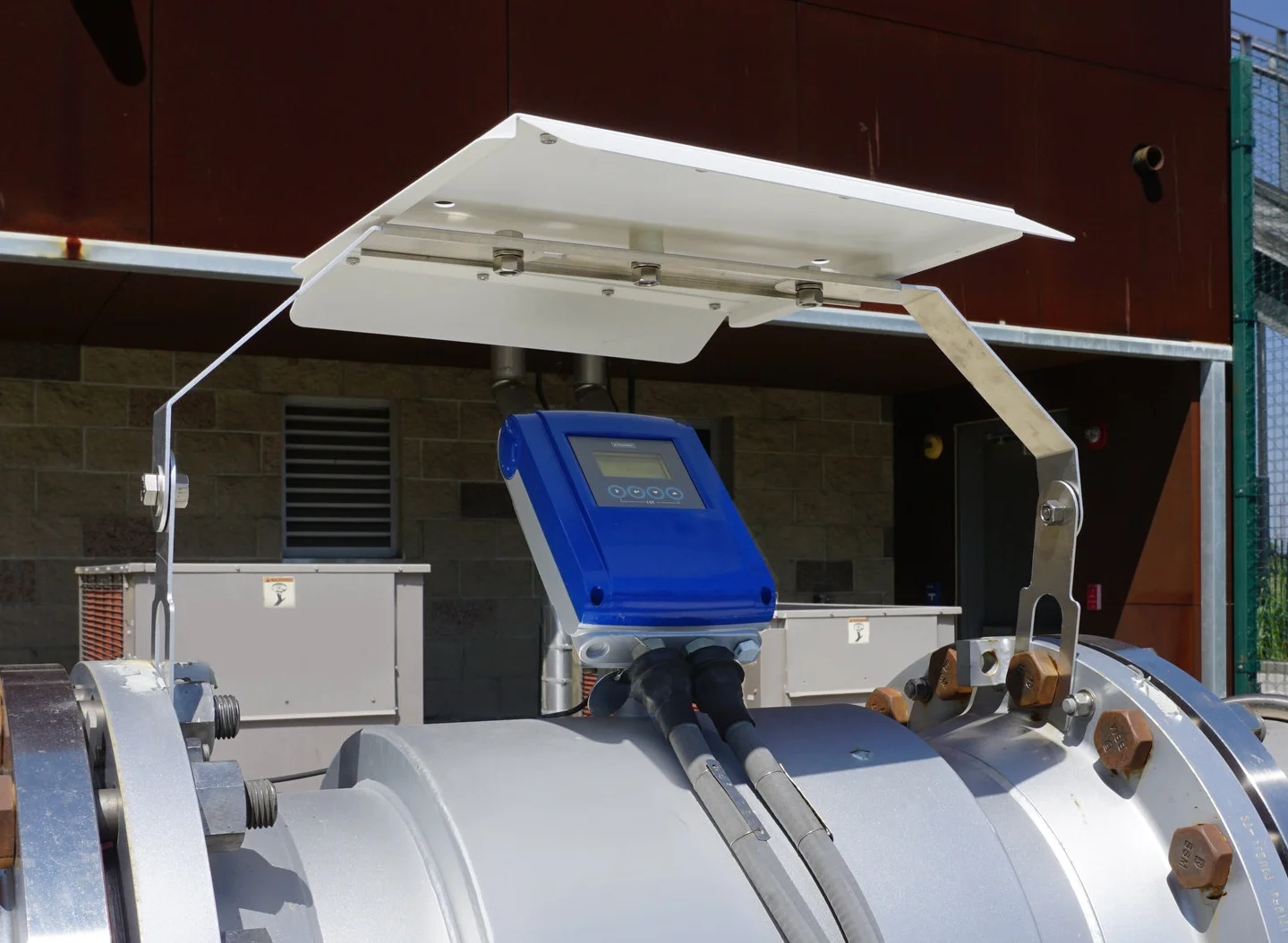 AMS Pipe mount sunshade for a krohne magnetic flowmeter.