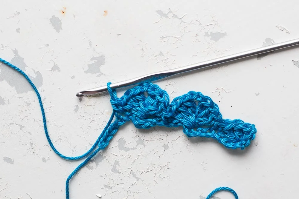  Step 8: Miss 5 chains from the cluster you just made (or 1 stitch from the first set of trebles you made). Double crochet 1. 