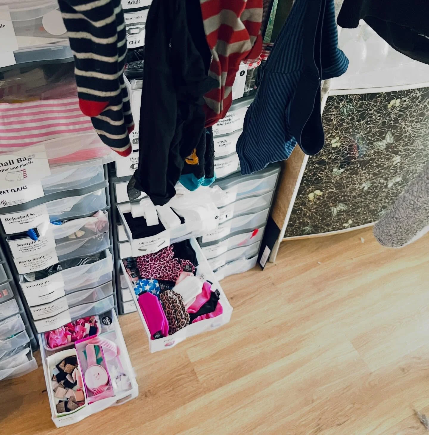 When I say Hid-In is a Small Business, I mean it.
Look. Here, under the stairs, nestled behind the drying socks, is my empire, between the shoes and the craft projects.

When I say &lsquo;family business&rsquo; I mean Hid-In is the extra child that I
