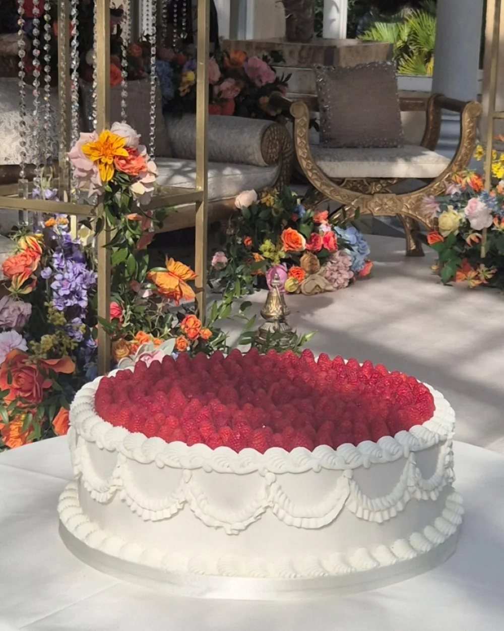 italian style wedding cake  with raspberrys in syon house
