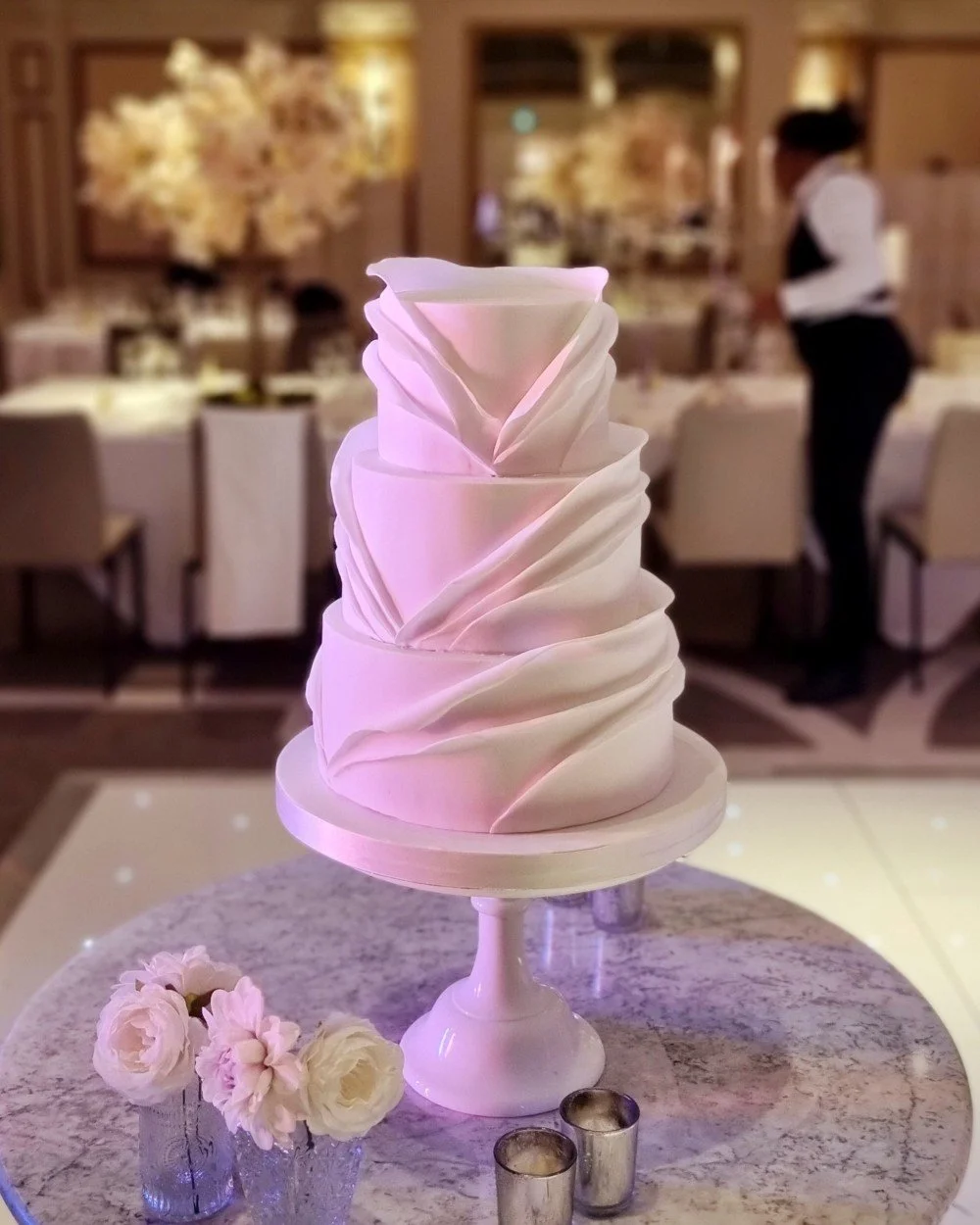 Sophisticated cake with wrapped icing effect at the Kimpton Fitzroy in central London