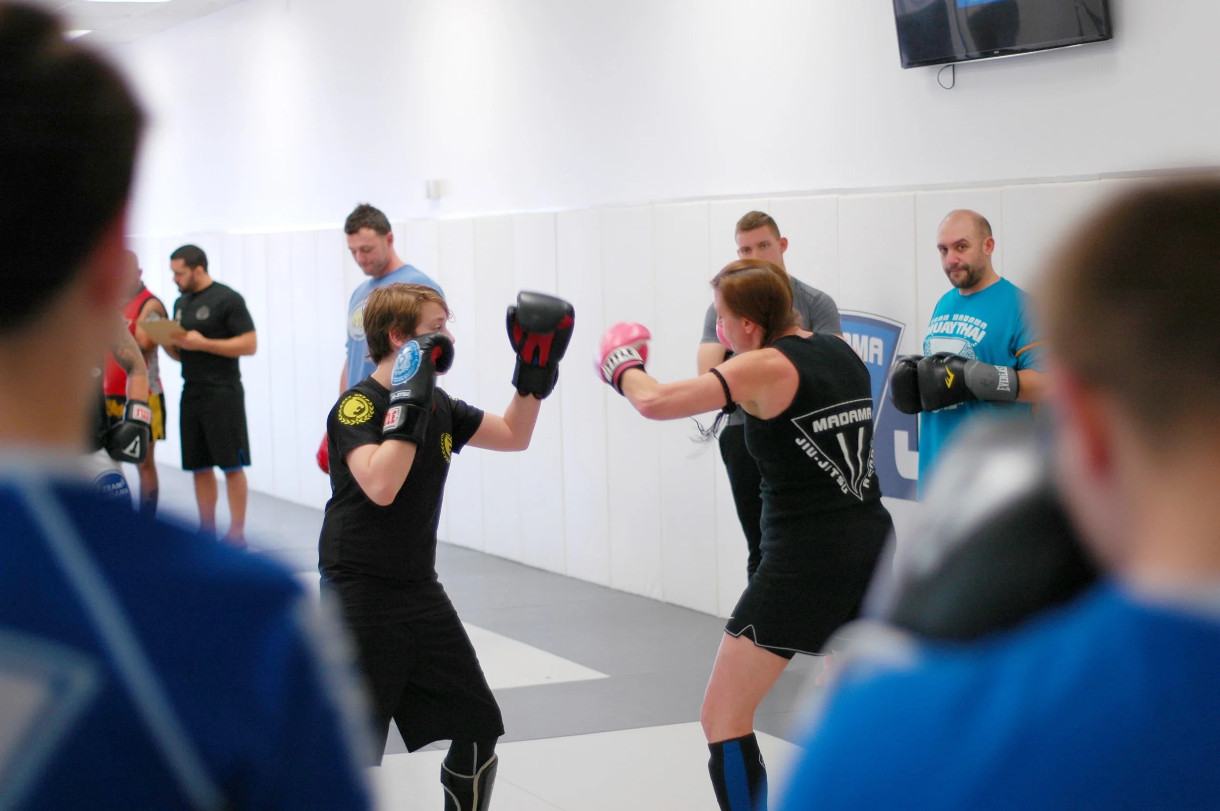  Family martial arts - Mom and Son team Sandy and Caldwell McCormick showing moves to the class 